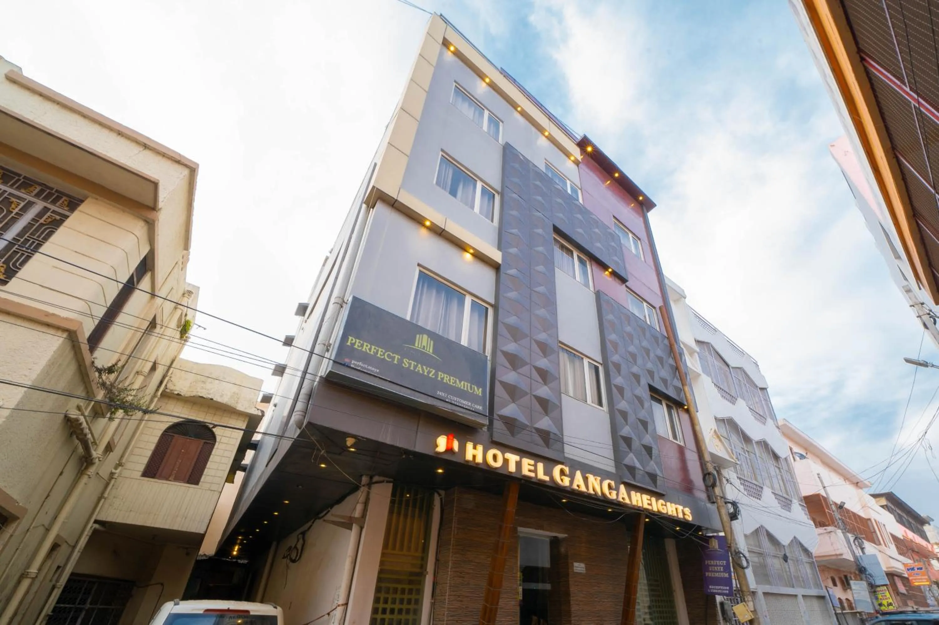 Property building in Perfectstayz Premium Ganga Heights - Ganga View rooftop cafe