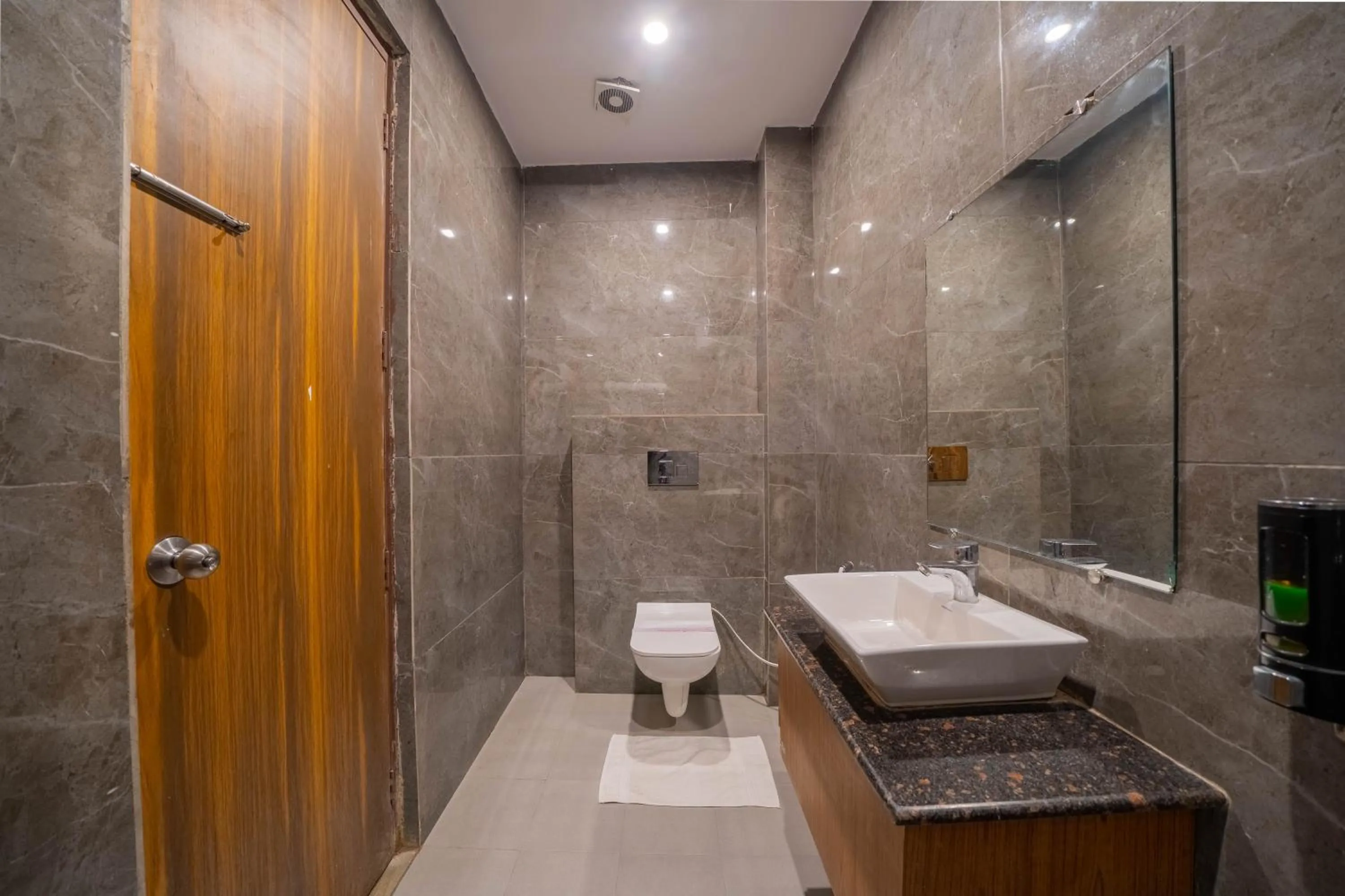 Bathroom in Perfectstayz Premium Ganga Heights - Ganga View rooftop cafe
