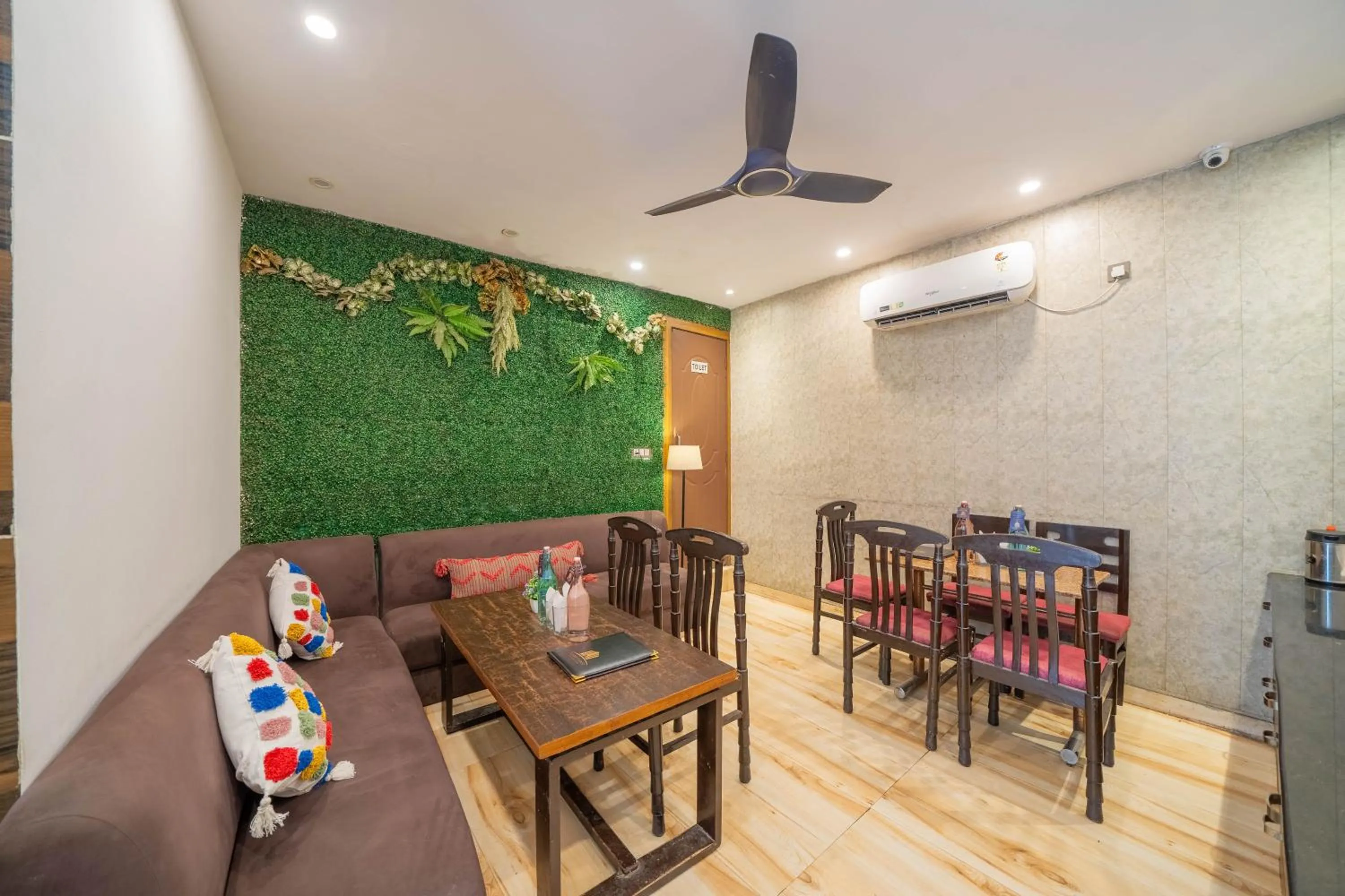 Dining area in Perfectstayz Premium Ganga Heights - Ganga View rooftop cafe
