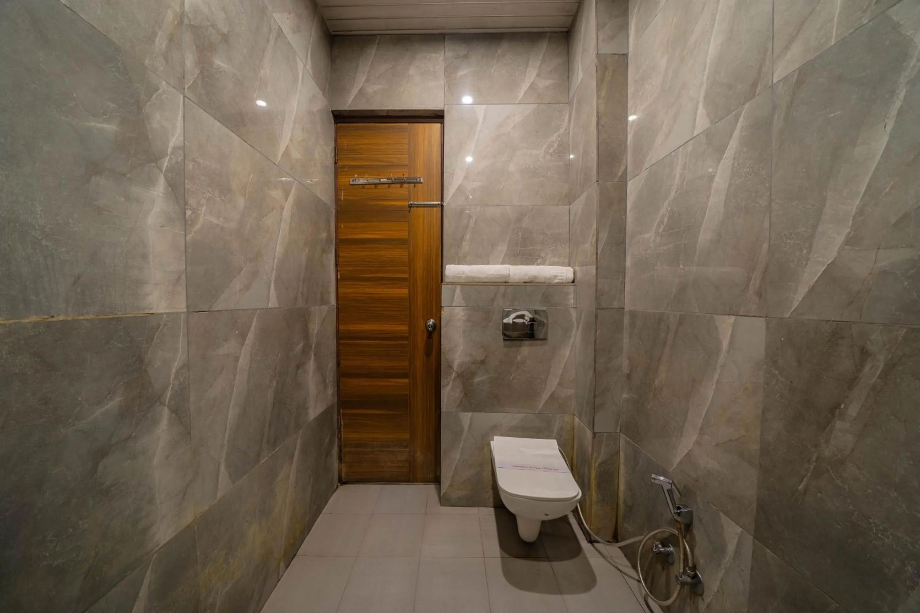 Bathroom in Perfectstayz Premium Ganga Heights - Ganga View rooftop cafe