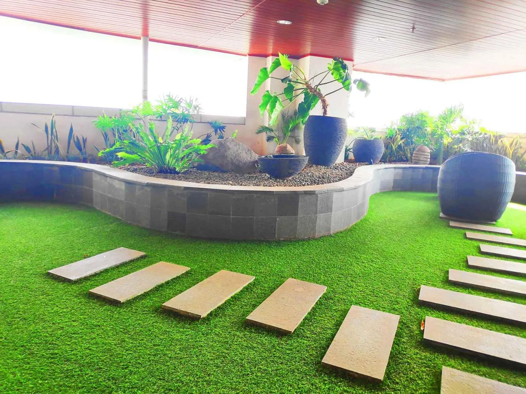 Garden in Apartemen Grand Kamala Lagoon by 21 Room