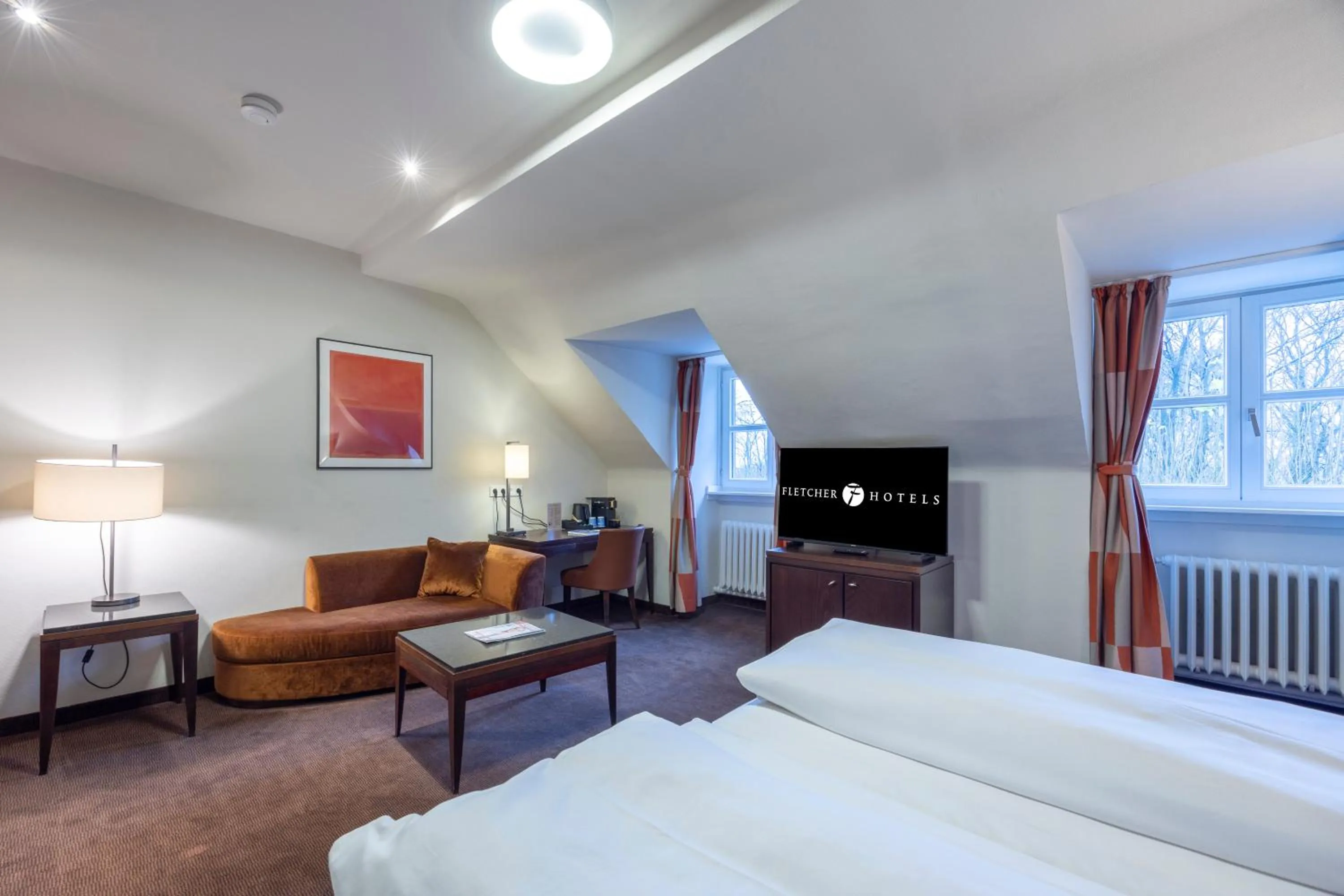 Living room, Bed in Fletcher Waldhotel Nordrhein-Westfalen