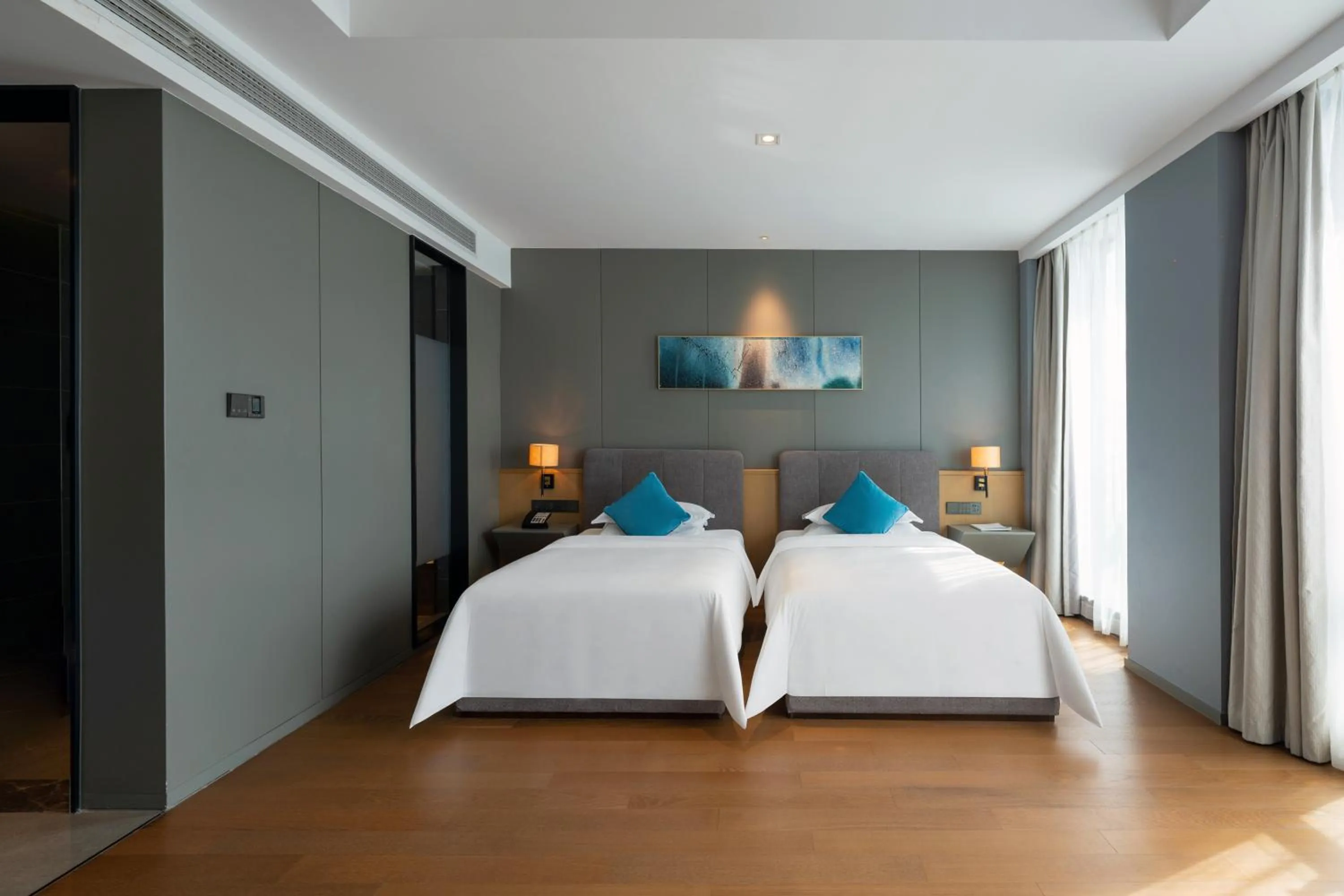 Bed in SSAW Boutique Hotel Wenzhou Dexin