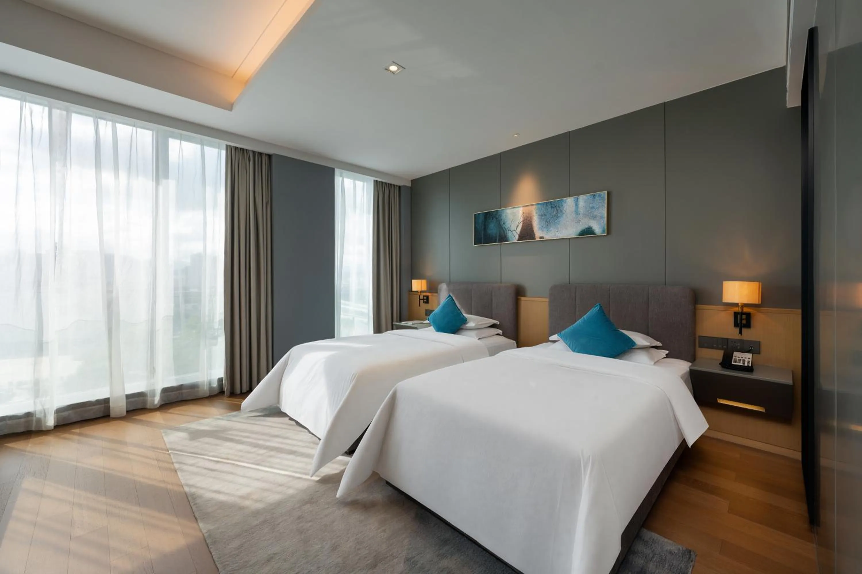 Bed in SSAW Boutique Hotel Wenzhou Dexin