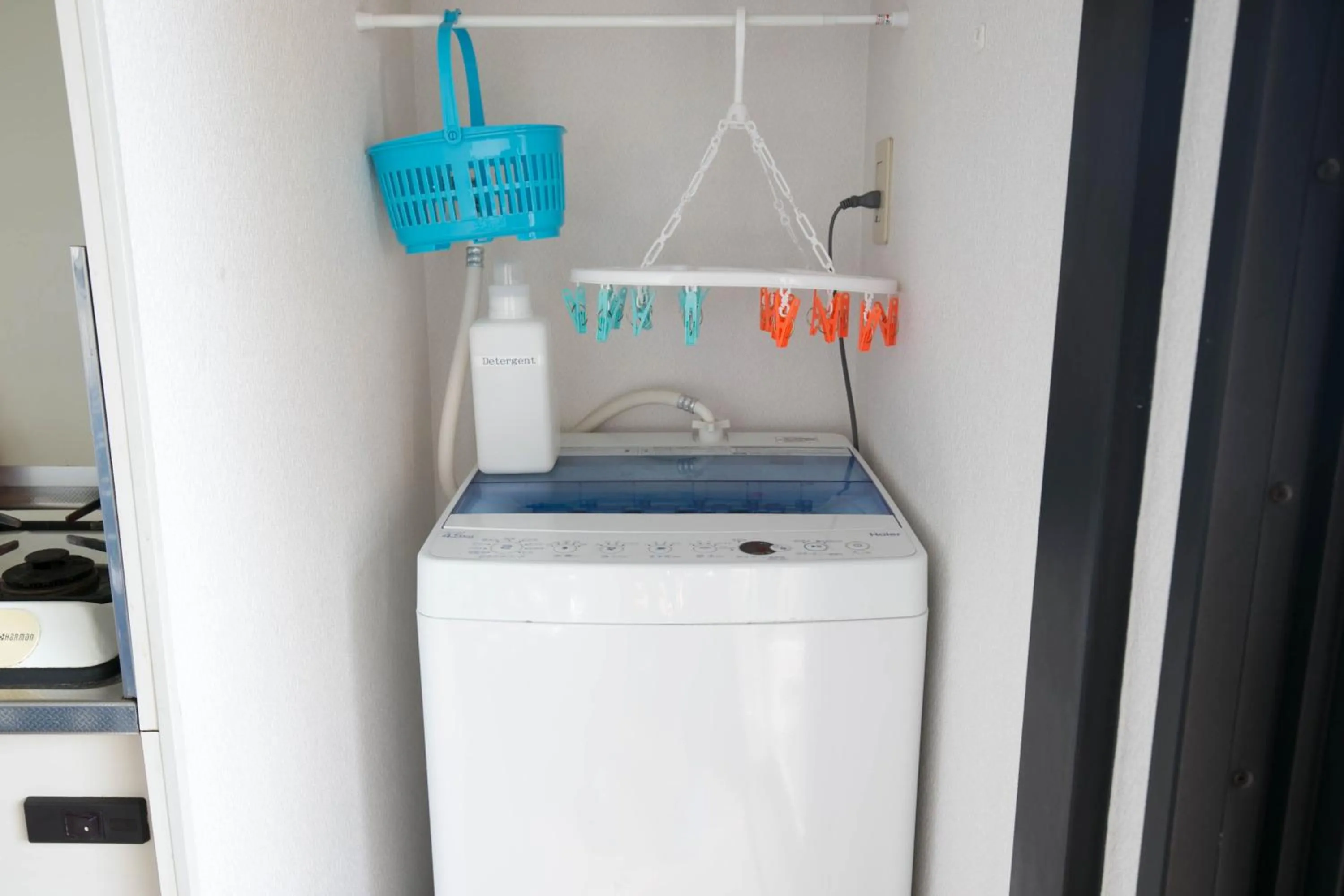 washing machine in SUMIYOSHI APARTMENT Hotel 住吉アパートメントホテル