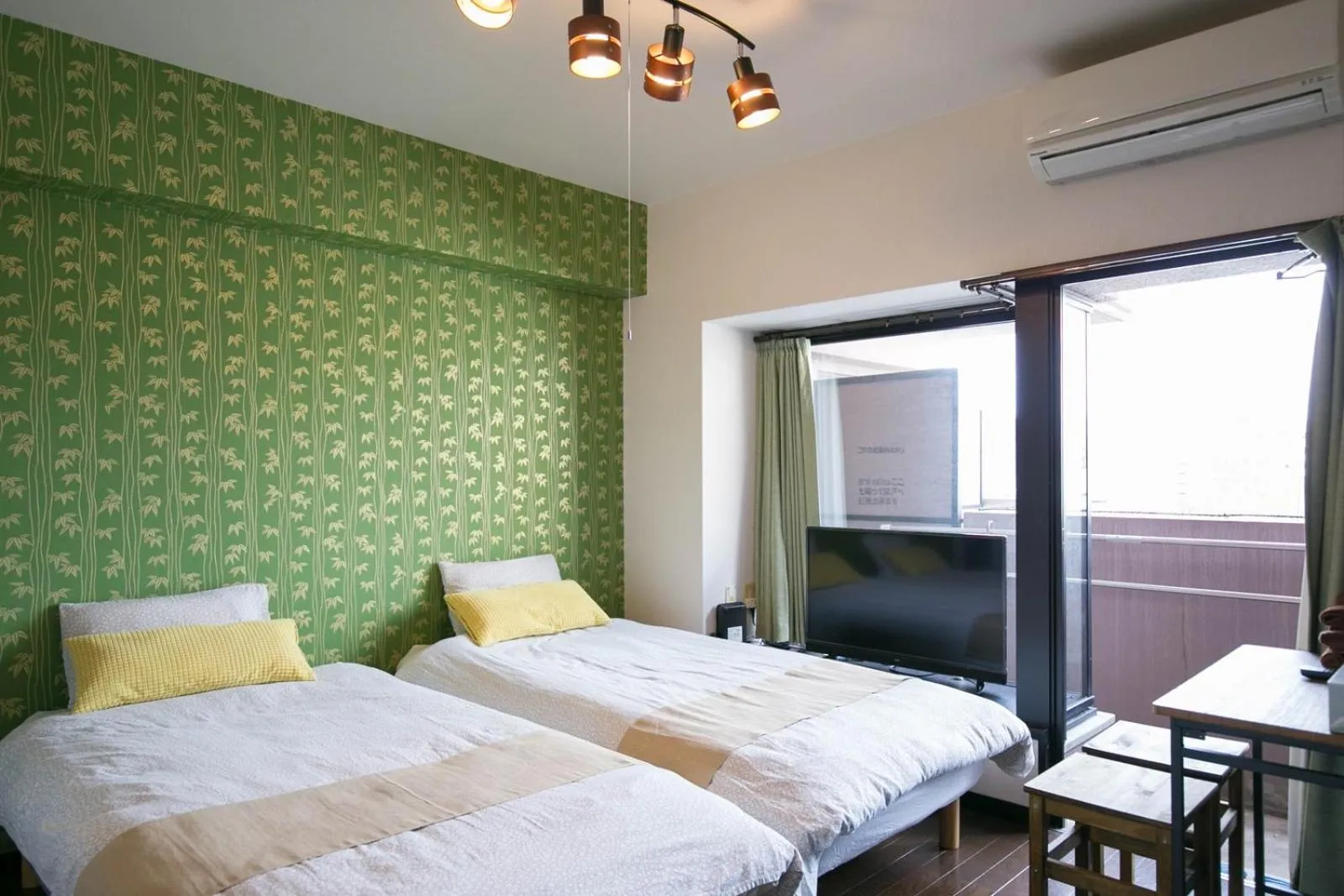 Bed in SUMIYOSHI APARTMENT Hotel 住吉アパートメントホテル