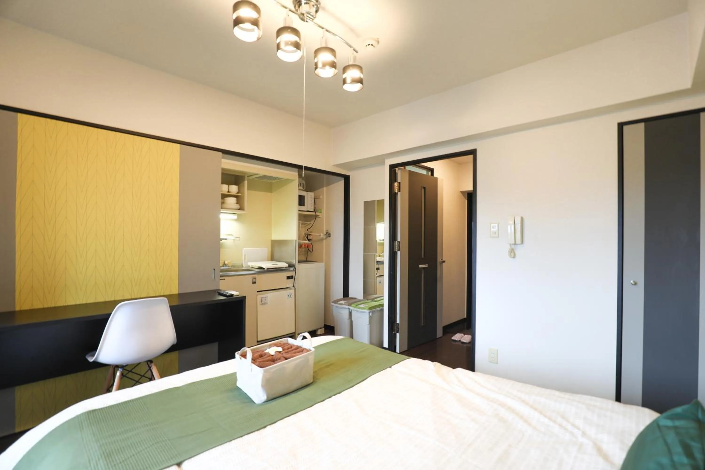 Bed in SUMIYOSHI APARTMENT Hotel 住吉アパートメントホテル