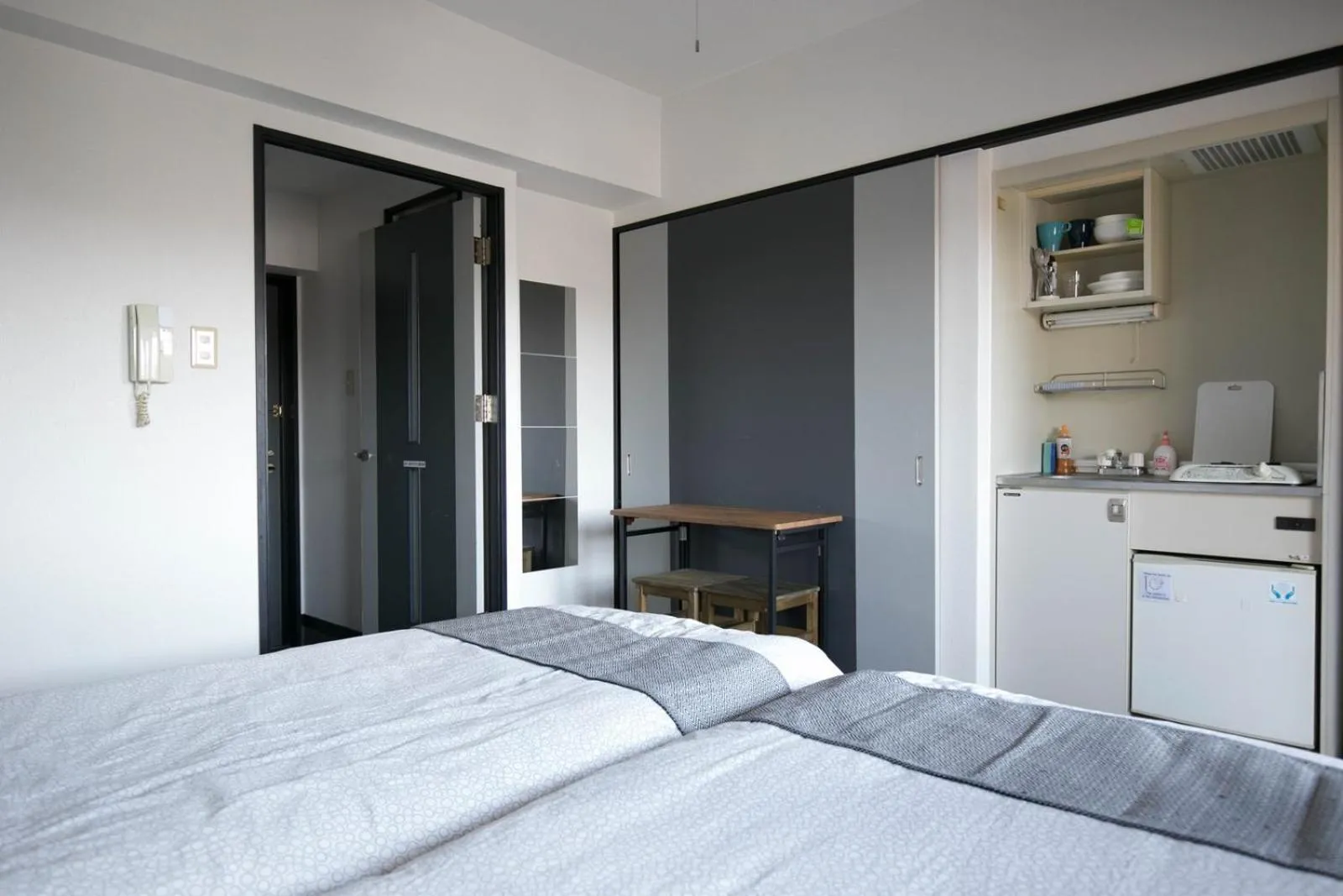 Bed in SUMIYOSHI APARTMENT Hotel 住吉アパートメントホテル