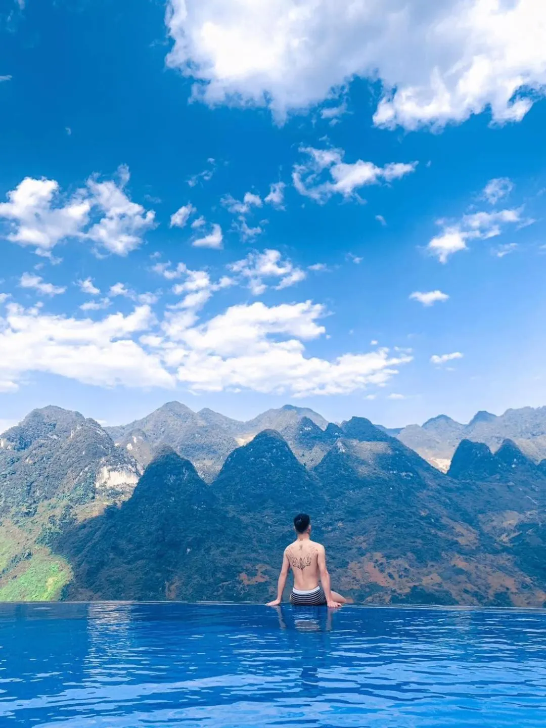 Swimming pool in H'mong Village Resort Ha Giang