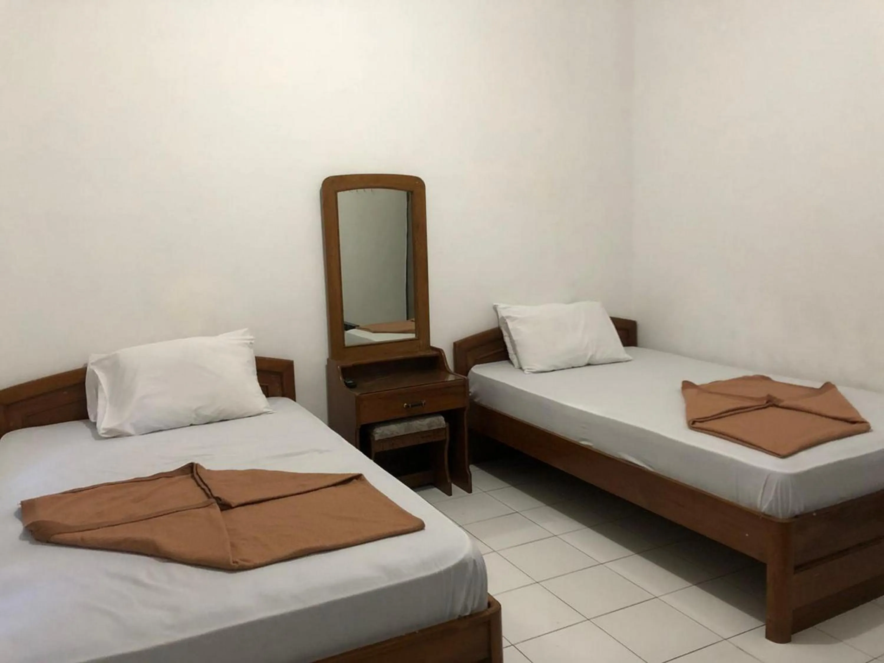Bed in Hotel Baru Inn Batu RedPartner