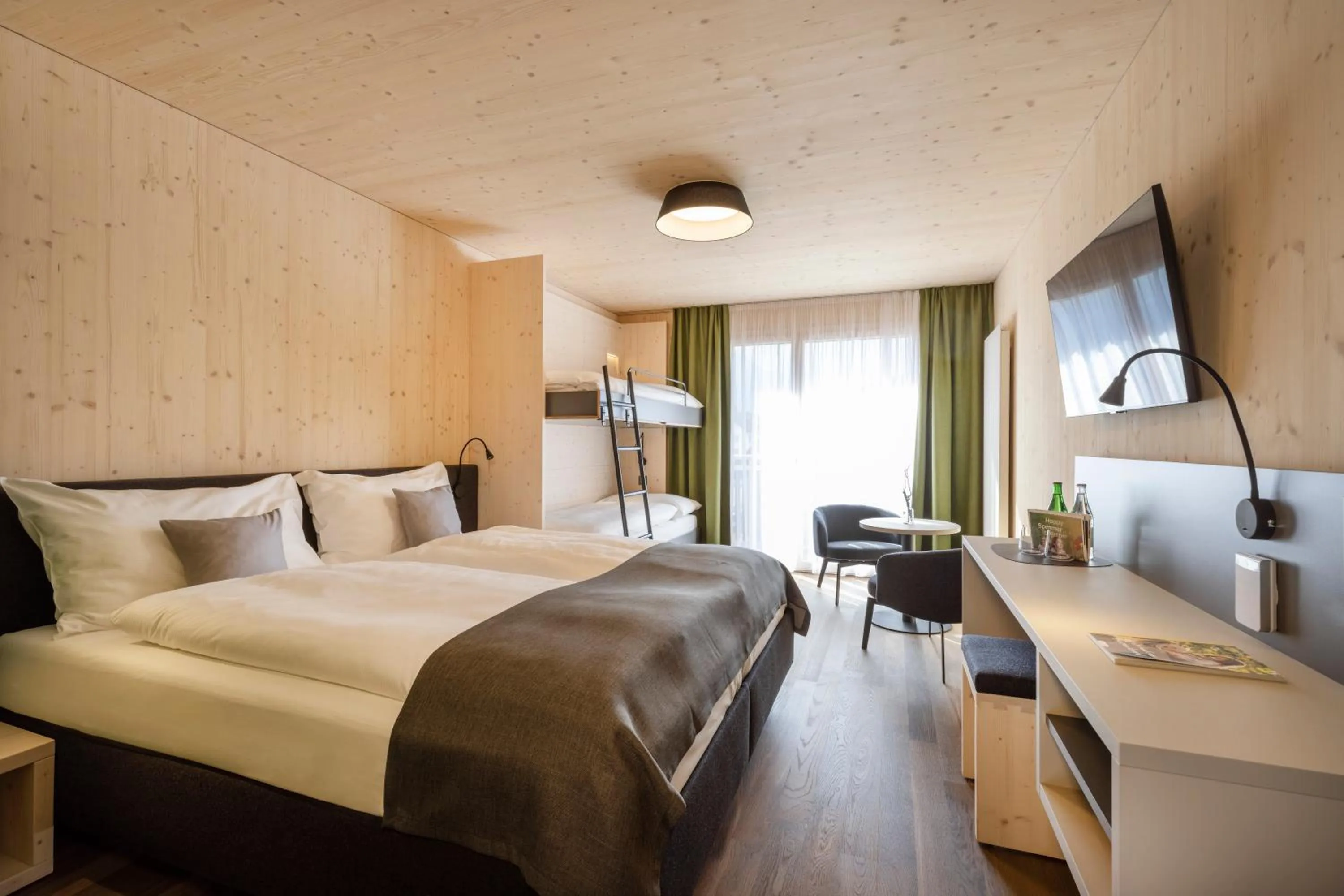 Photo of the whole room, Bed in JUFA Hotel Savognin