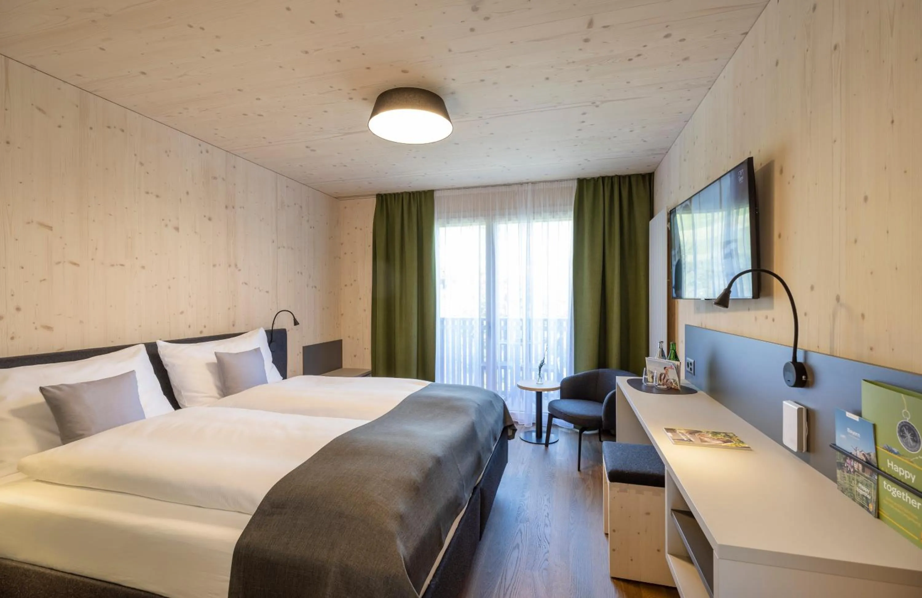 Photo of the whole room, Bed in JUFA Hotel Savognin