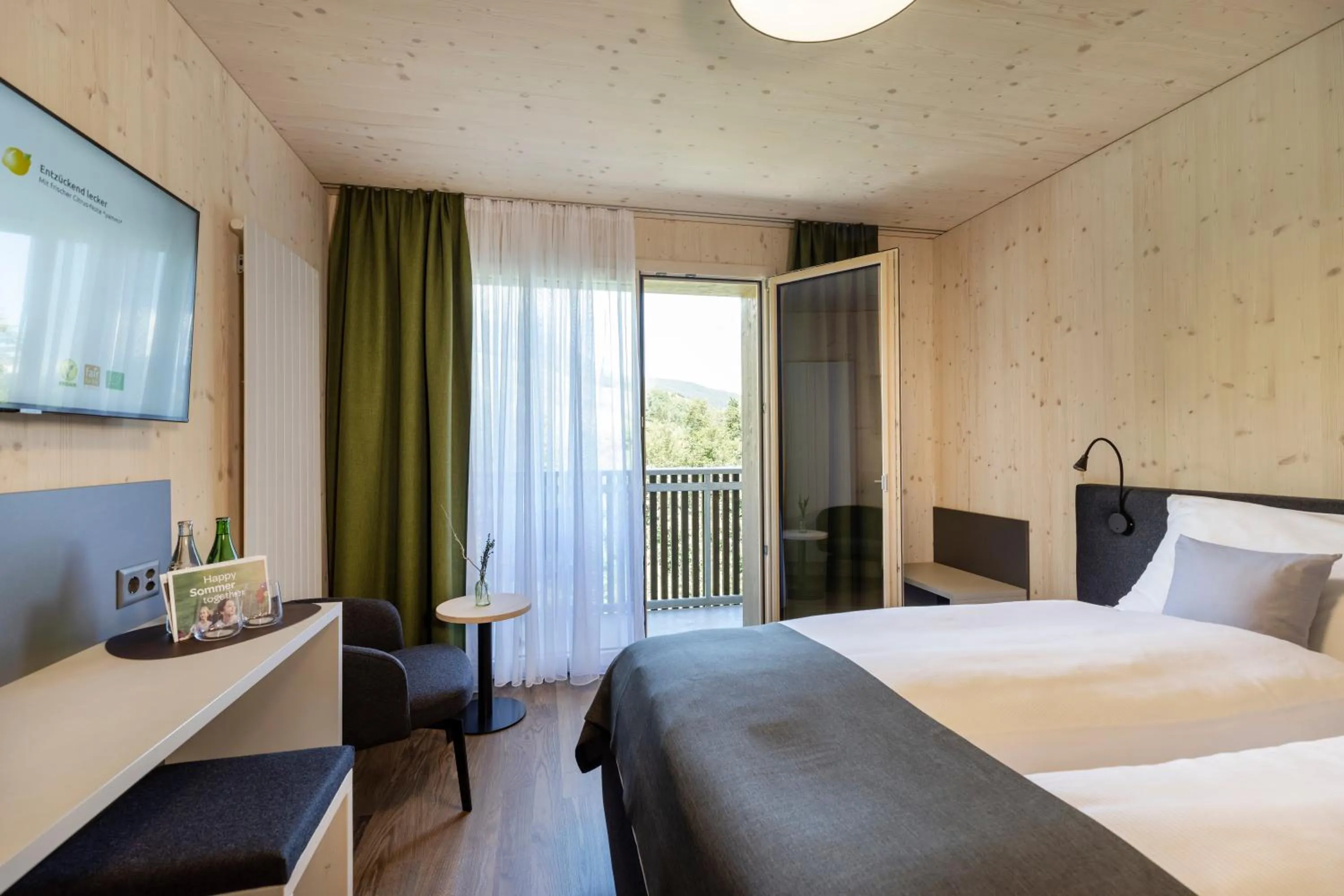 Photo of the whole room, Bed in JUFA Hotel Savognin