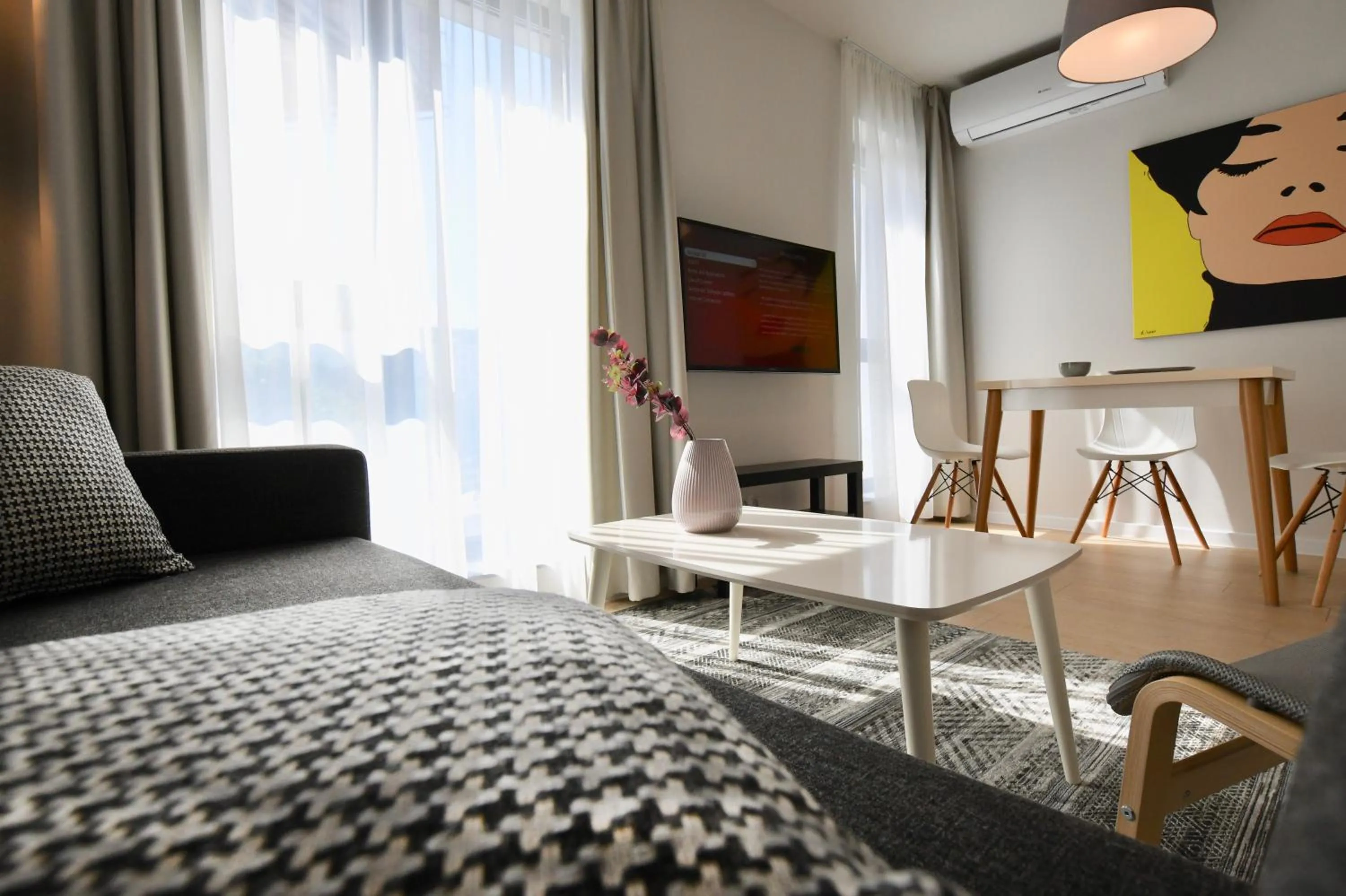 Living room, Bed in Connect Living Apartments