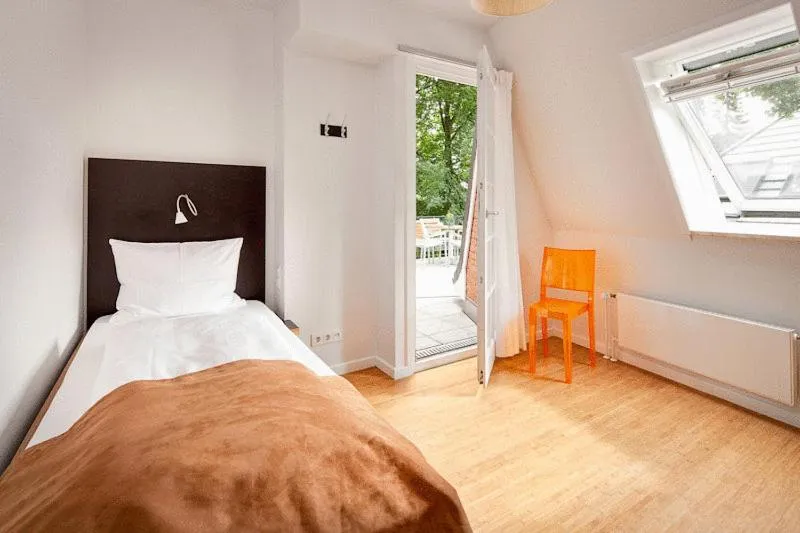 Bed in Das Gästehaus der Elb Lounge "Self Check In"