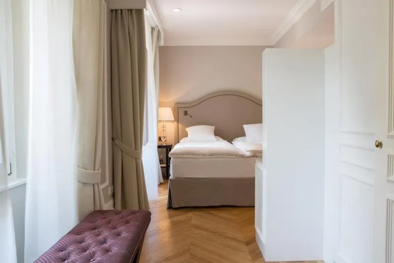 Bed in Victoria Jungfrau Grand Hotel & Spa