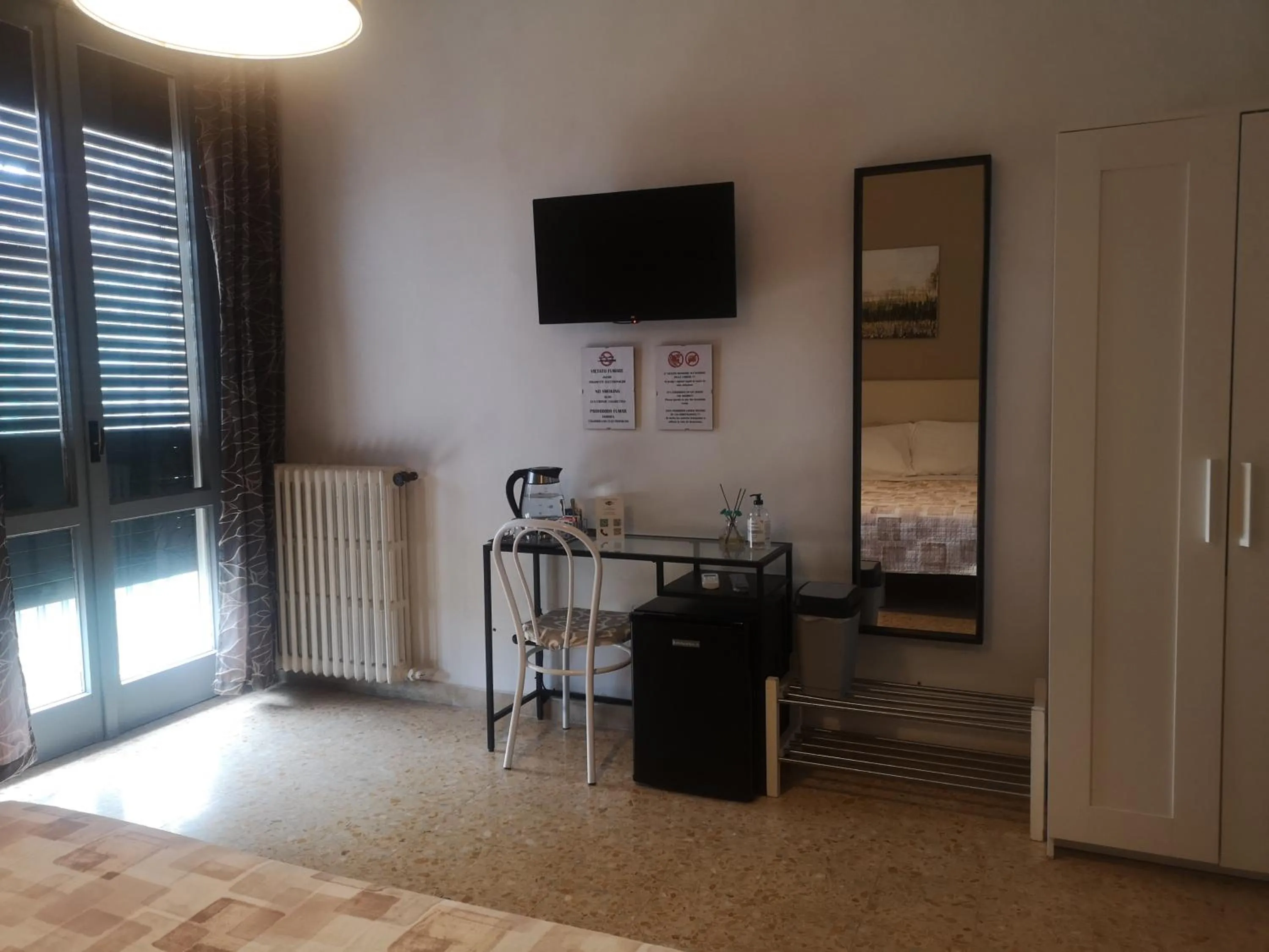 Triple Room with Private Bathroom in Vacanze Pisane