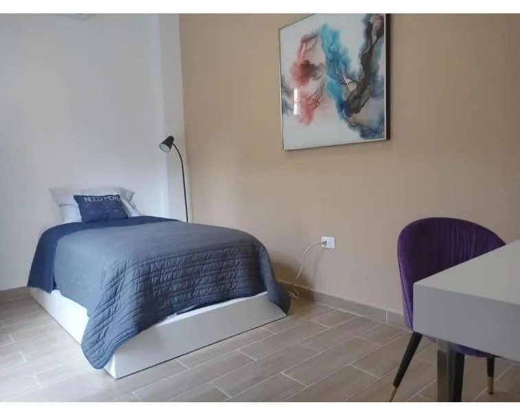 Bed in La Maja Suites