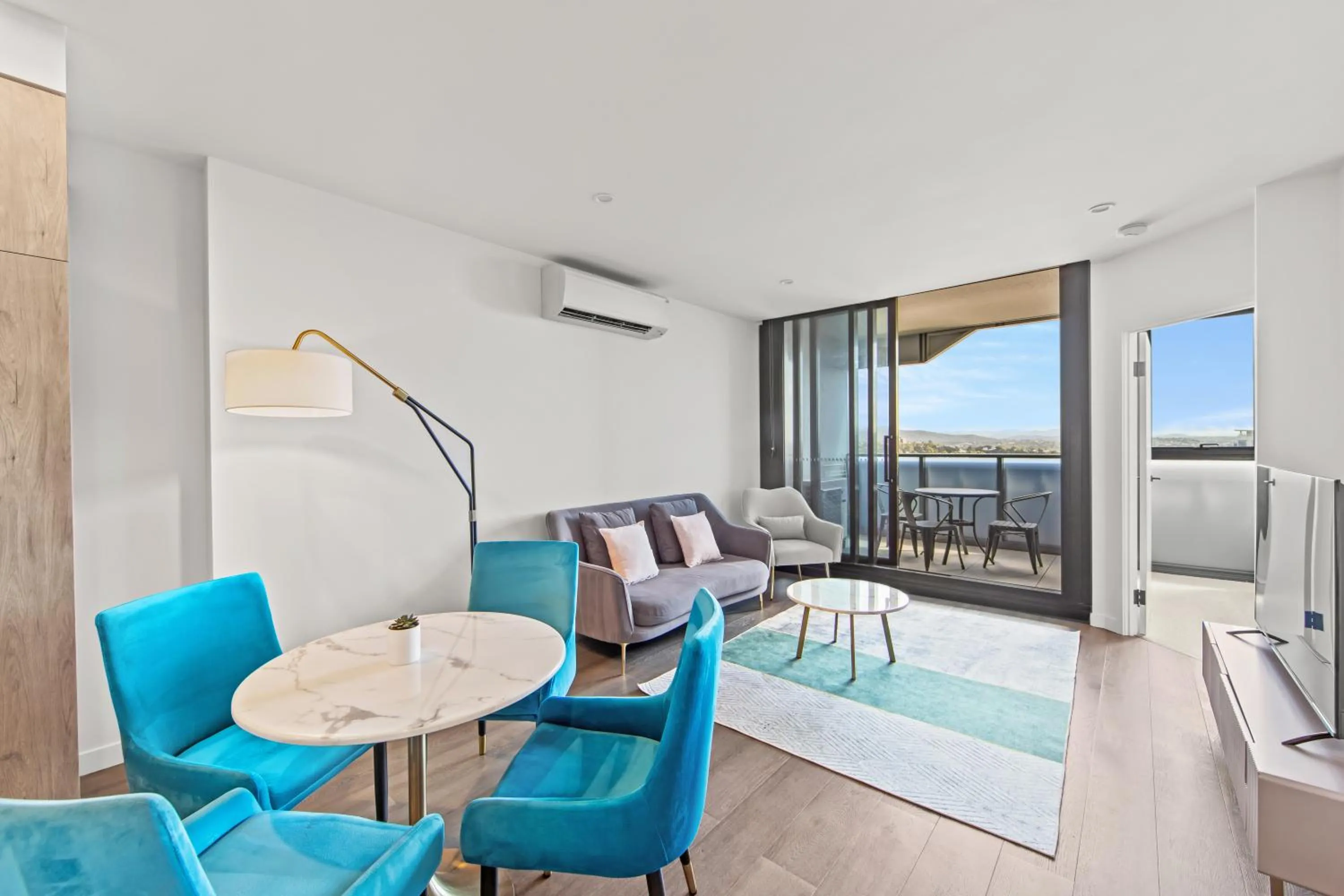 Living room in Fortitude Valley Apartments by CLLIX