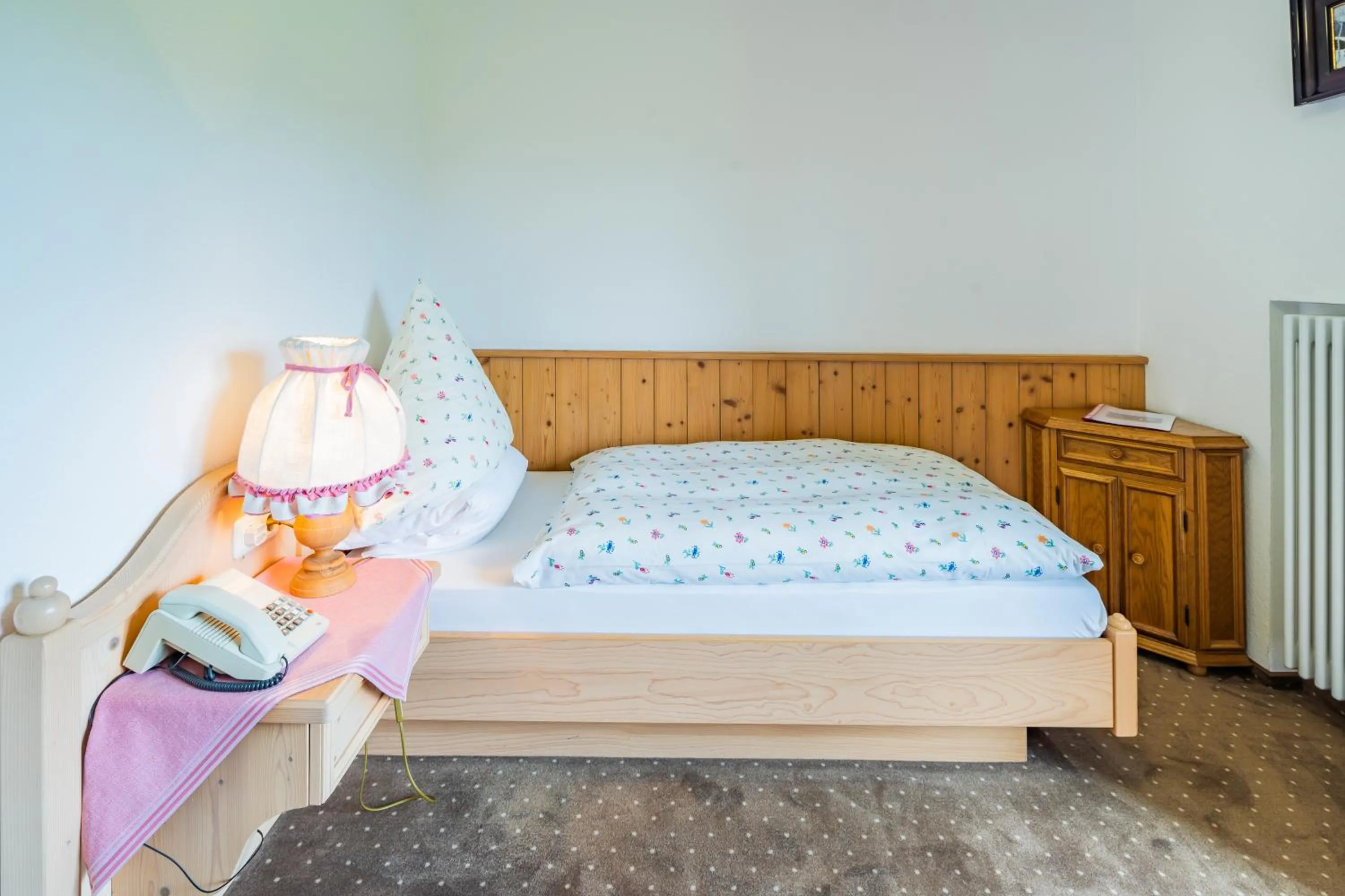 Bed in Hotel-Pension-Ostler