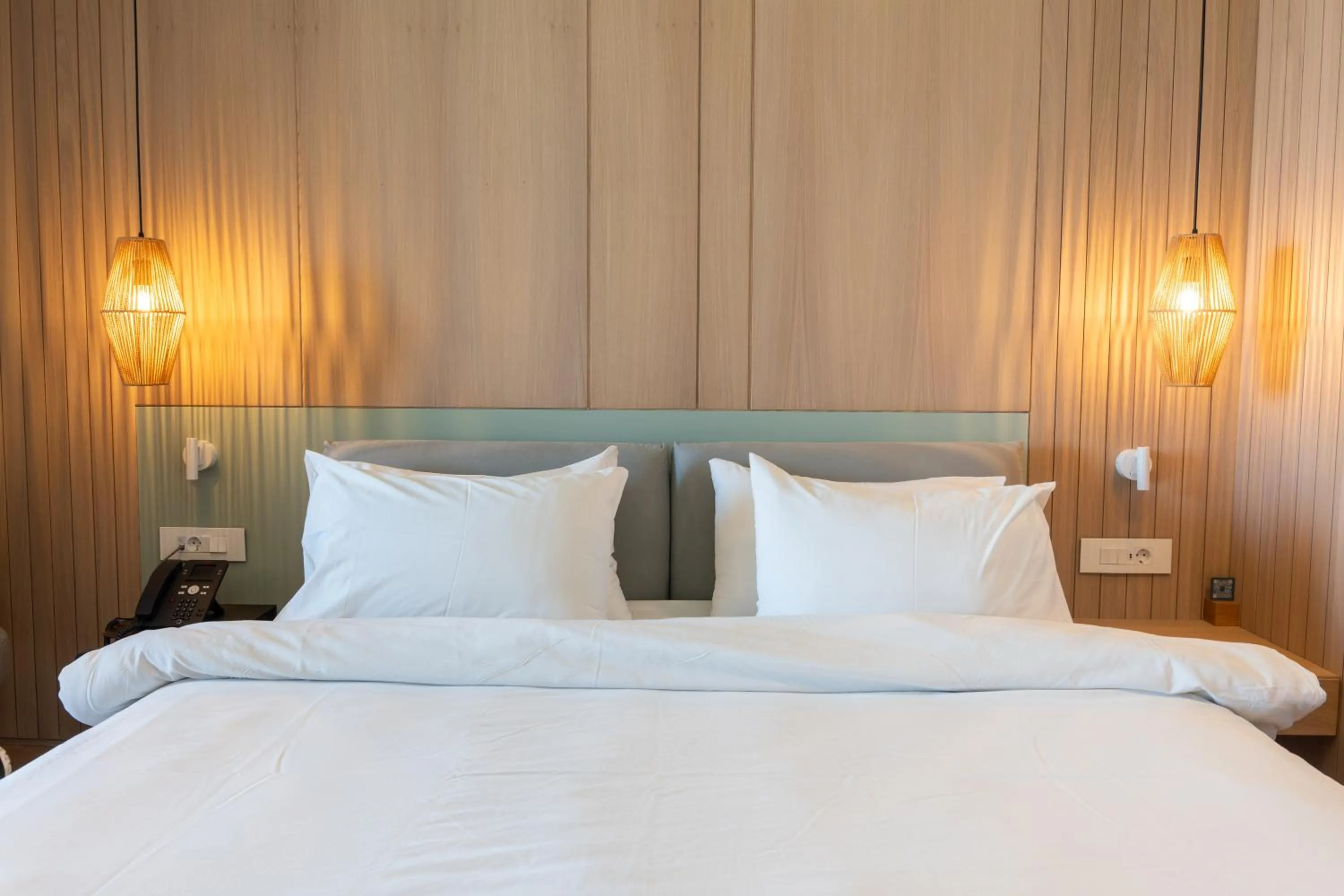 Bed in Oakridge Hotel & Spa