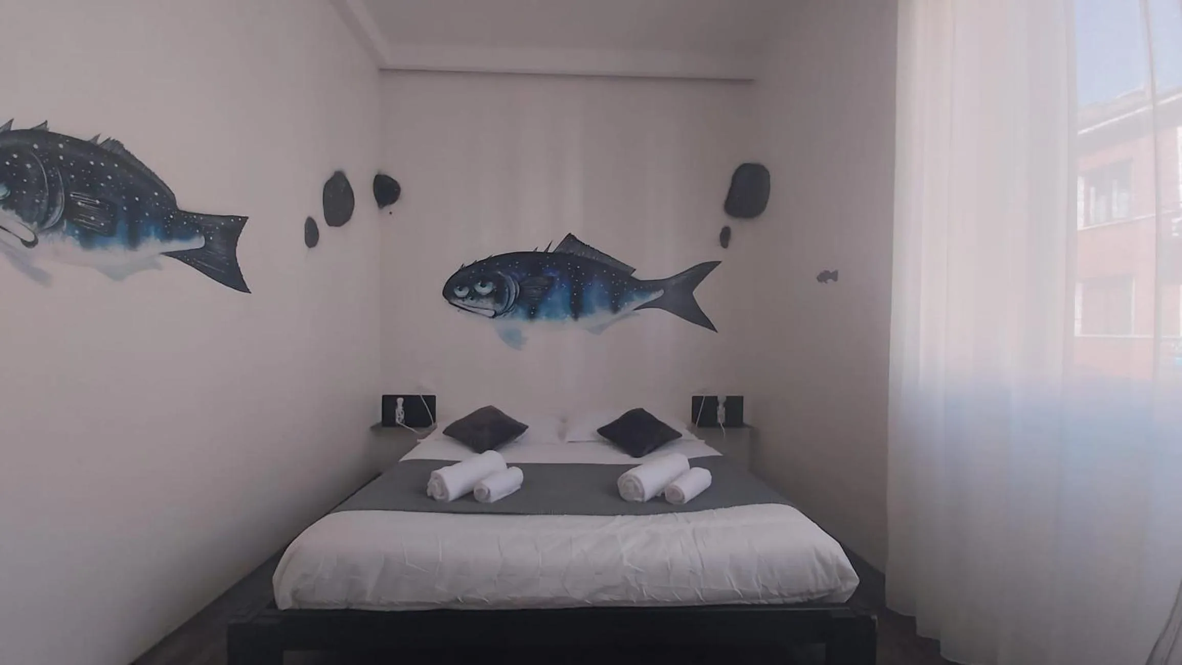 Bed in Street Art Inn Florence