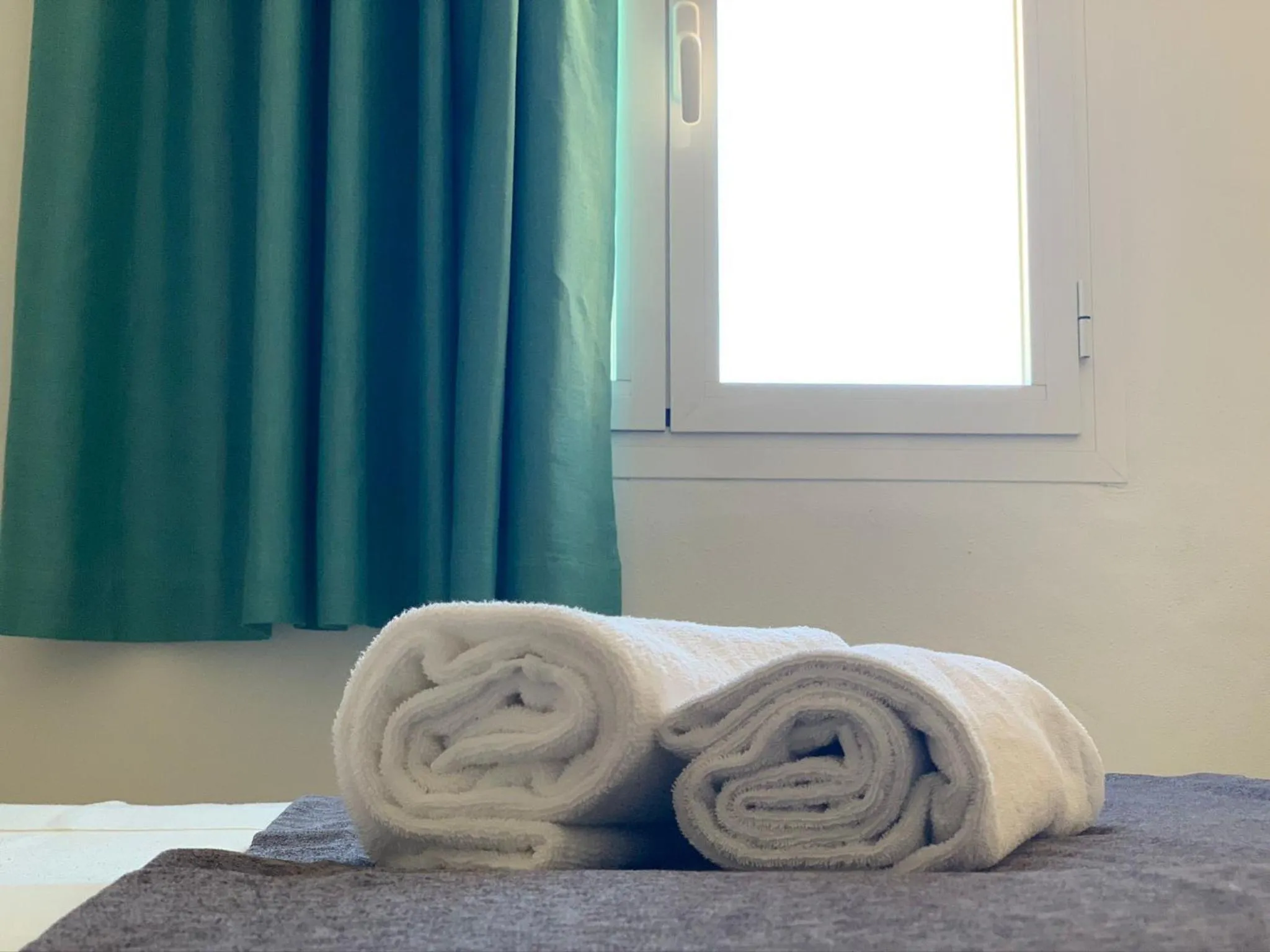 towels, Bed in Hotel LLITERAS
