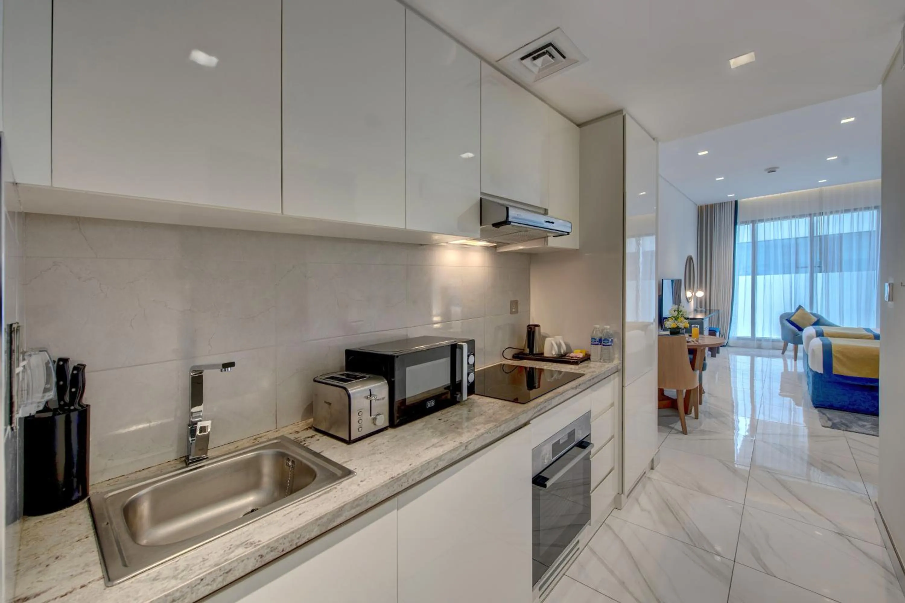 Kitchen or kitchenette in SUHA Mina Rashid Hotel Apartments