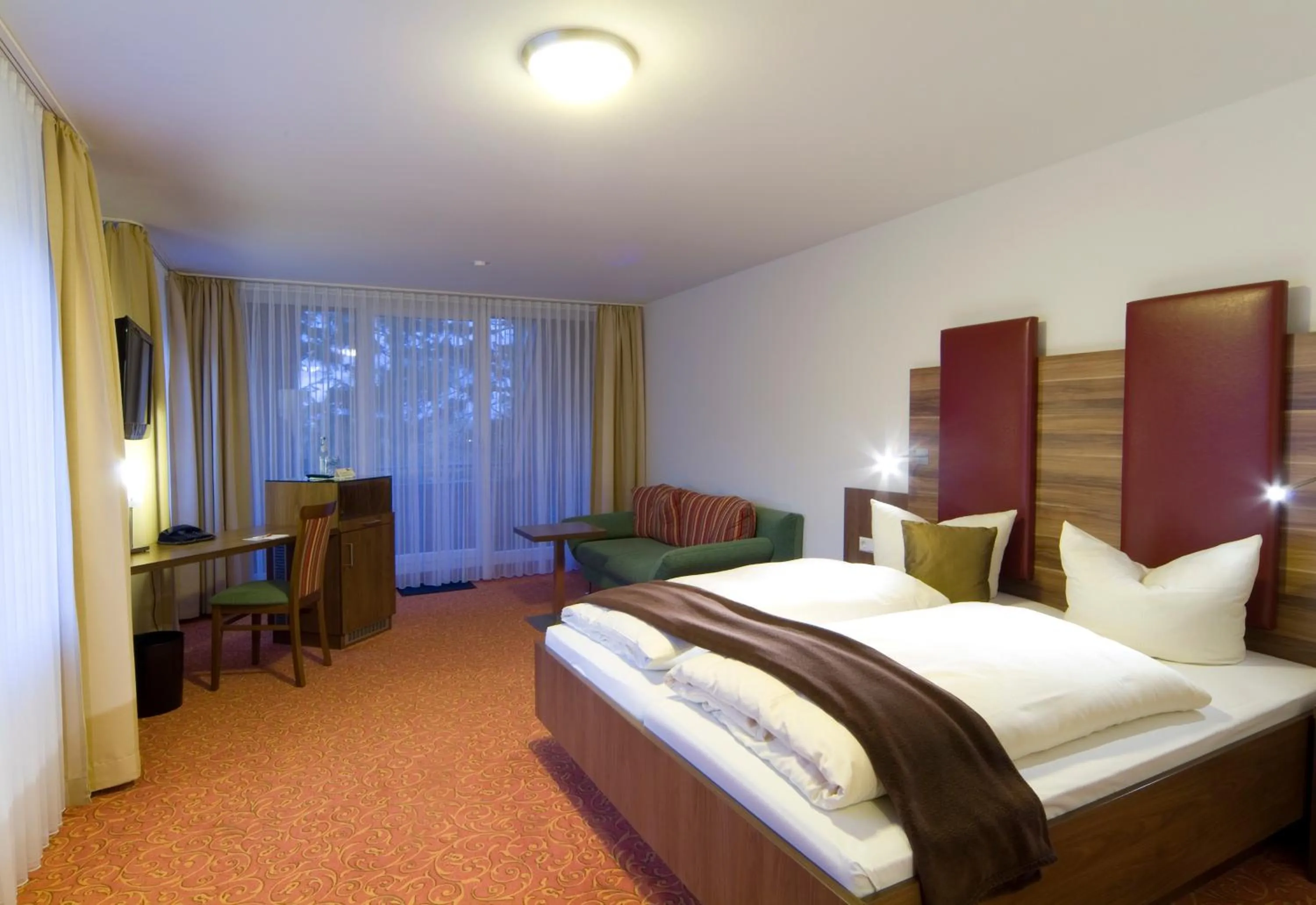 Bed in Hotel Sonneck