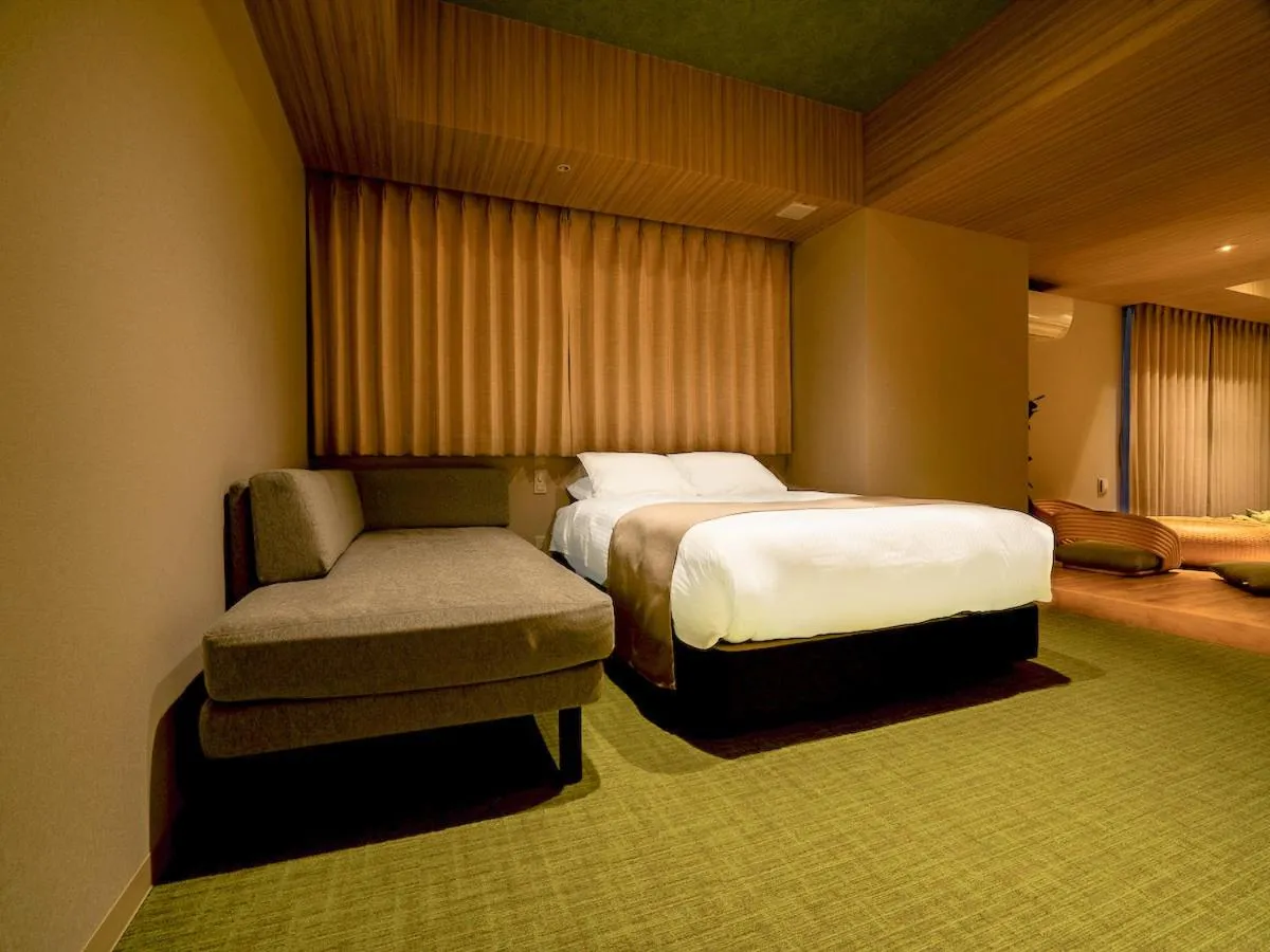 Bed in Randor Hotel Namba Osaka Suites