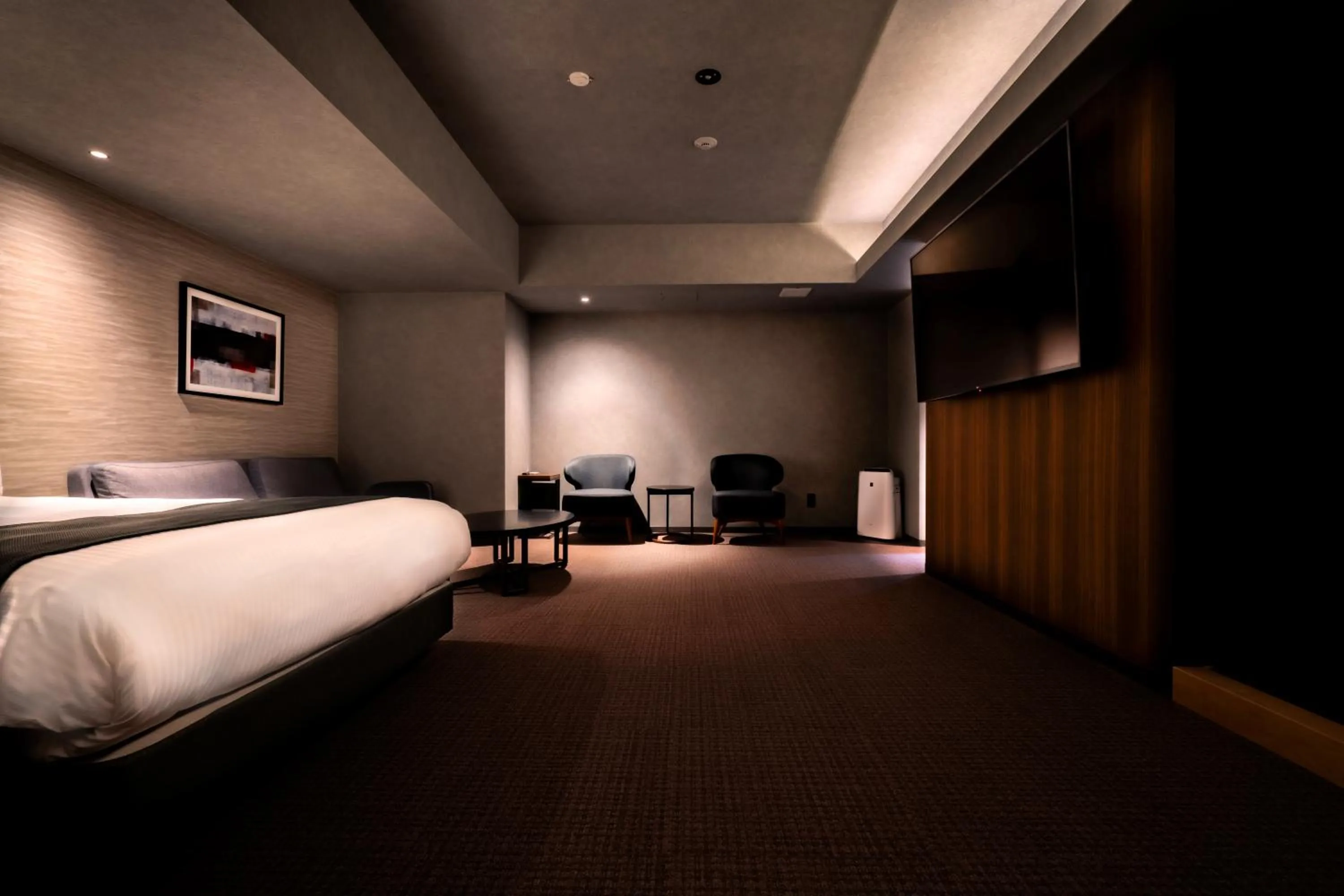 Photo of the whole room, Bed in Randor Hotel Namba Osaka Suites
