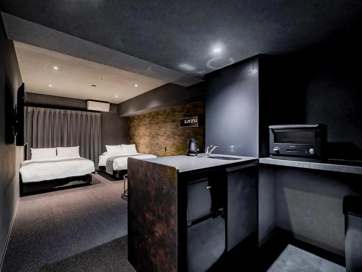 Bed in Randor Hotel Namba Osaka Suites