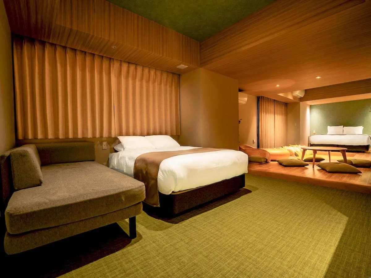 Bed in Randor Hotel Namba Osaka Suites