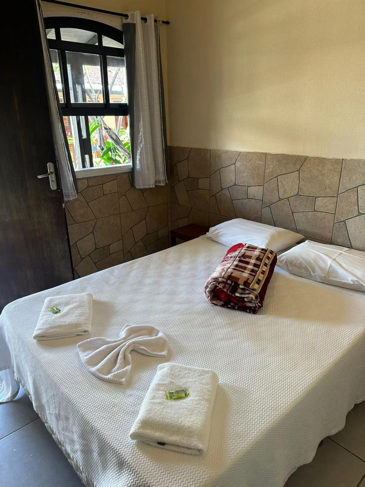 Bed in Pousada Thamalu