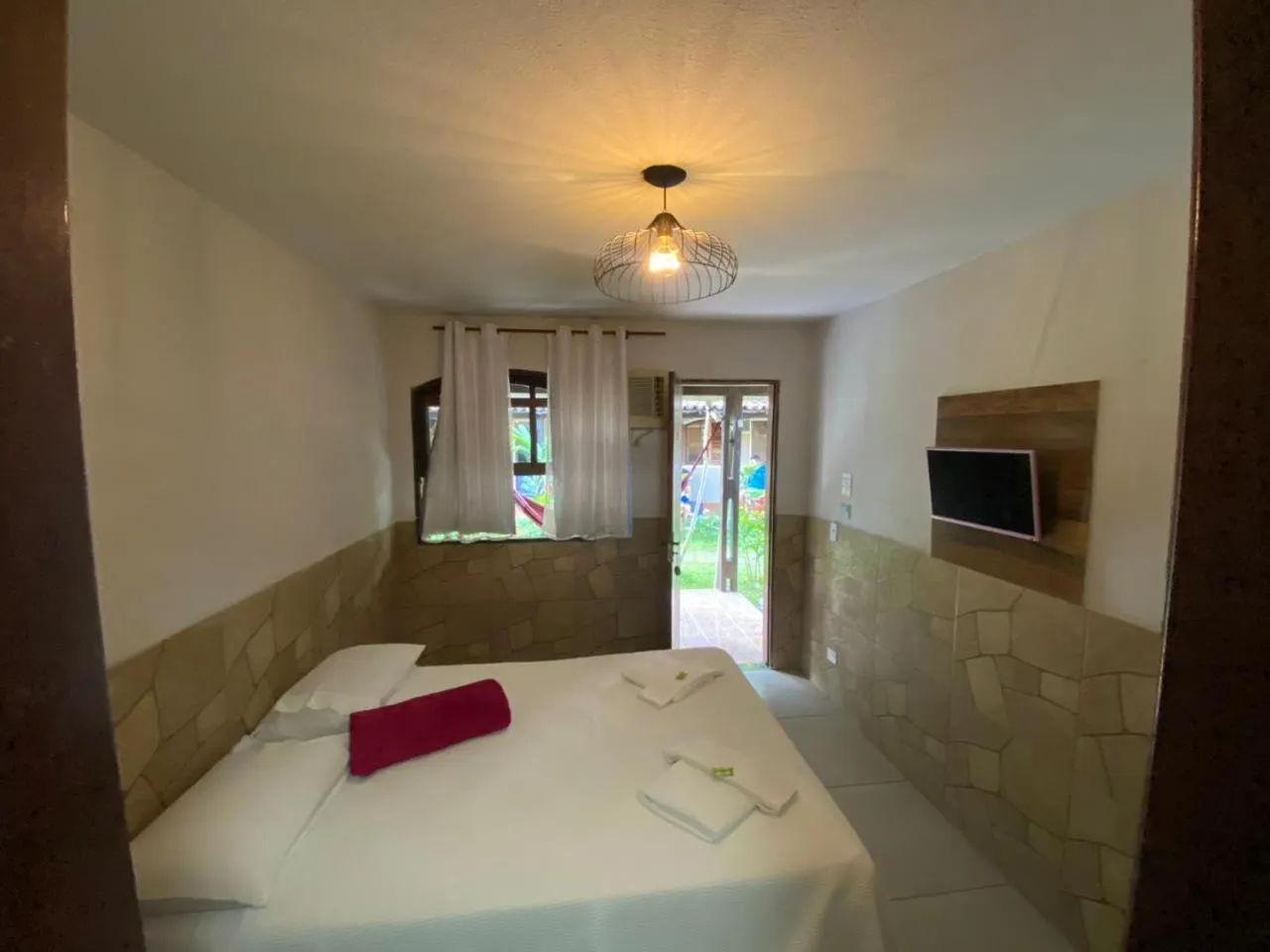 Bed in Pousada Thamalu