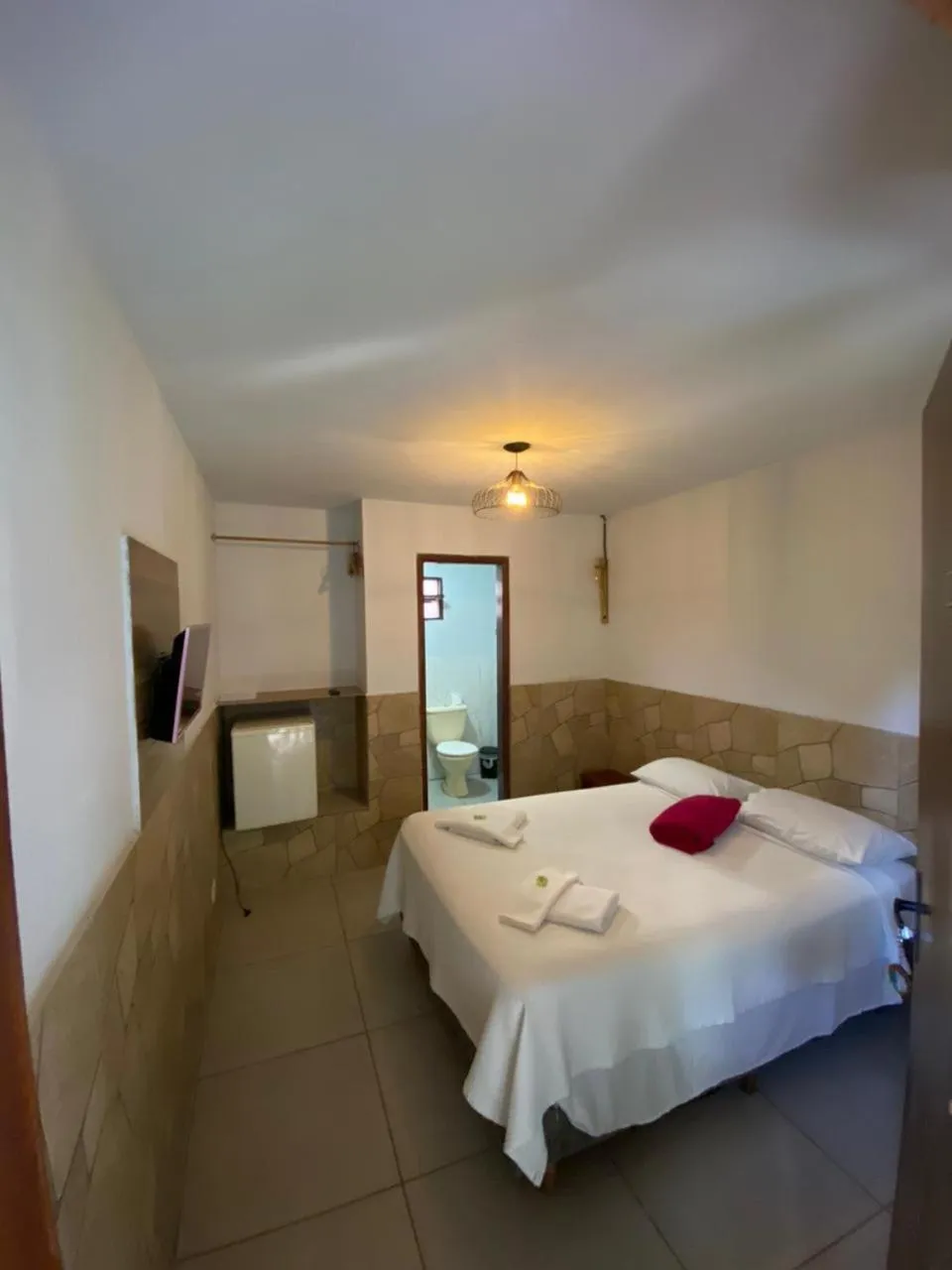 Bed in Pousada Thamalu