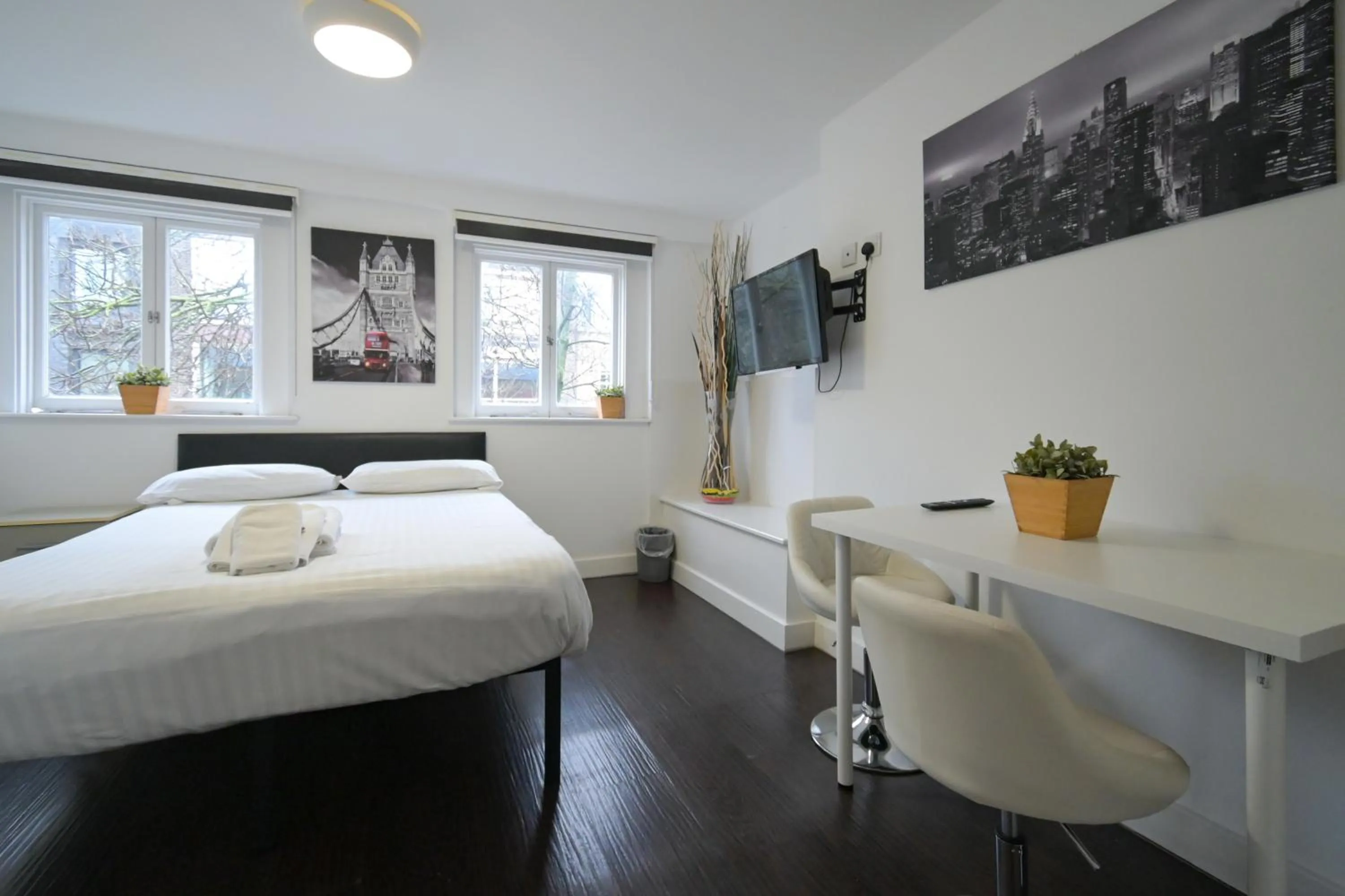 Bed in Charlotte Street Rooms by News Hotel