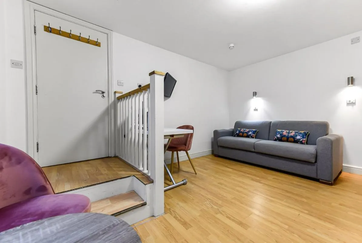 Seating area in Charlotte Street Rooms by News Hotel