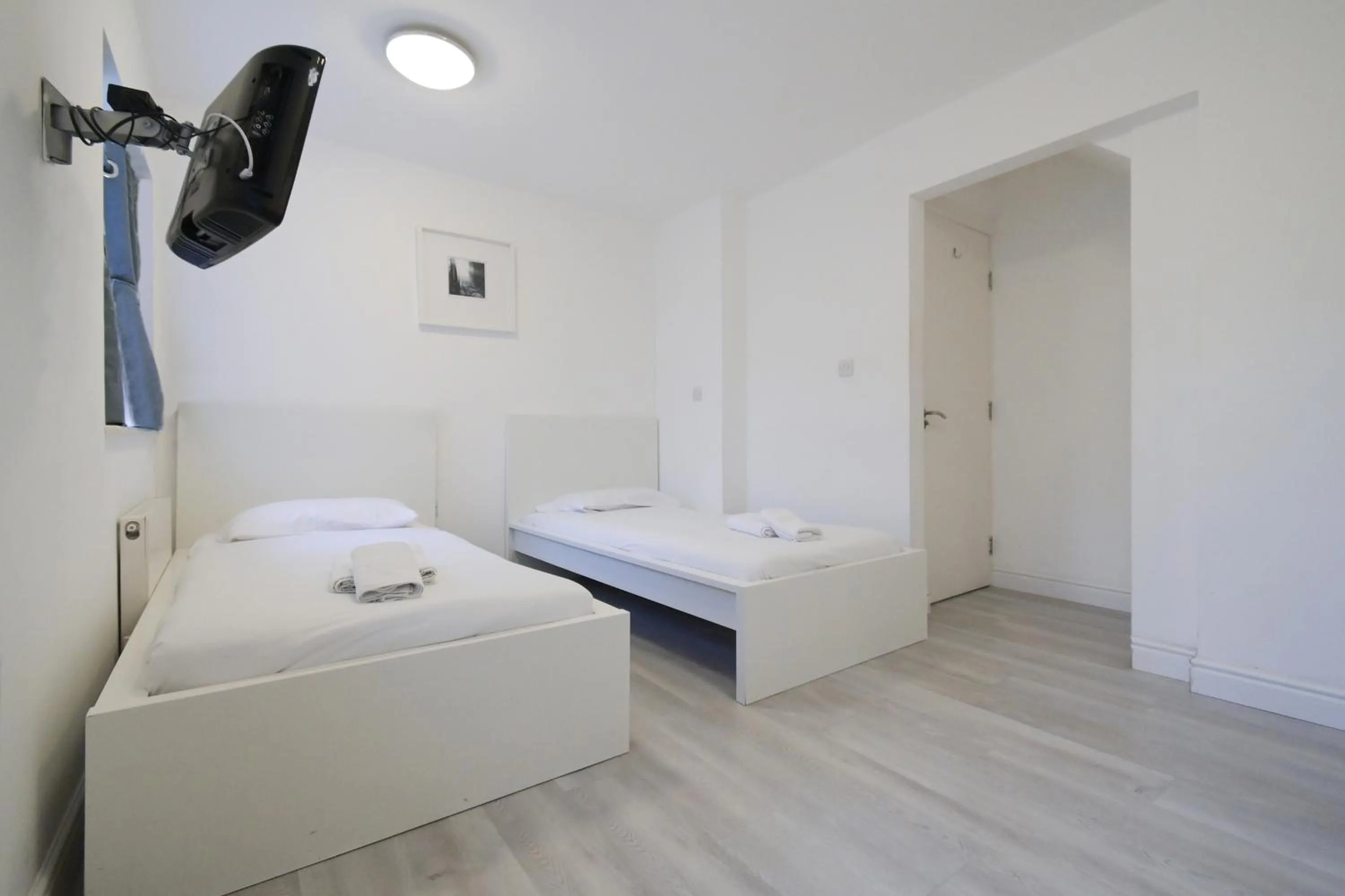 Bed in Charlotte Street Rooms by News Hotel