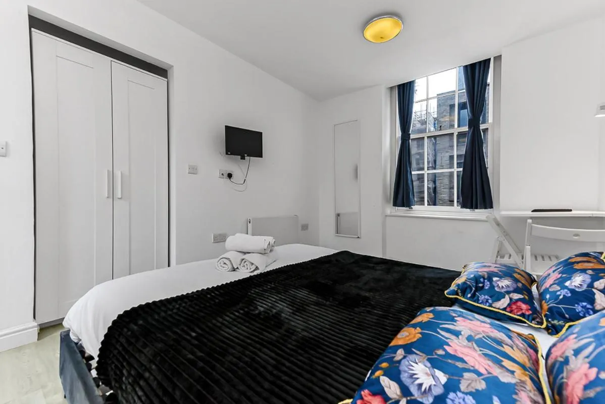Bed in Charlotte Street Rooms by News Hotel