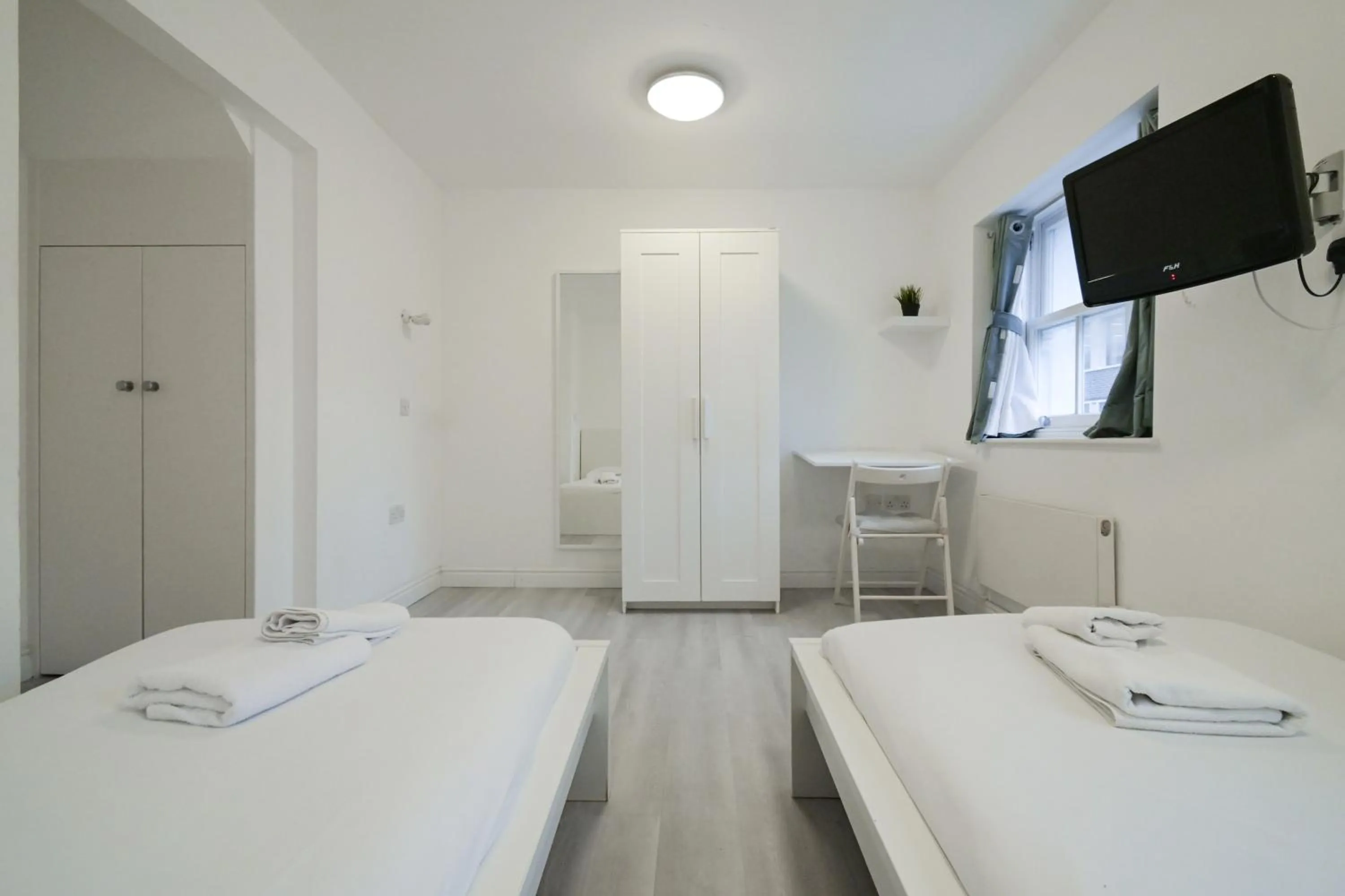 Bed in Charlotte Street Rooms by News Hotel