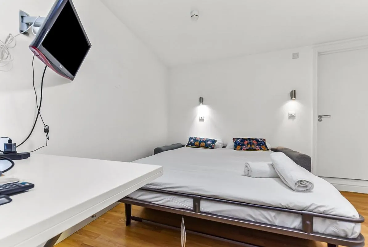 Bed in Charlotte Street Rooms by News Hotel