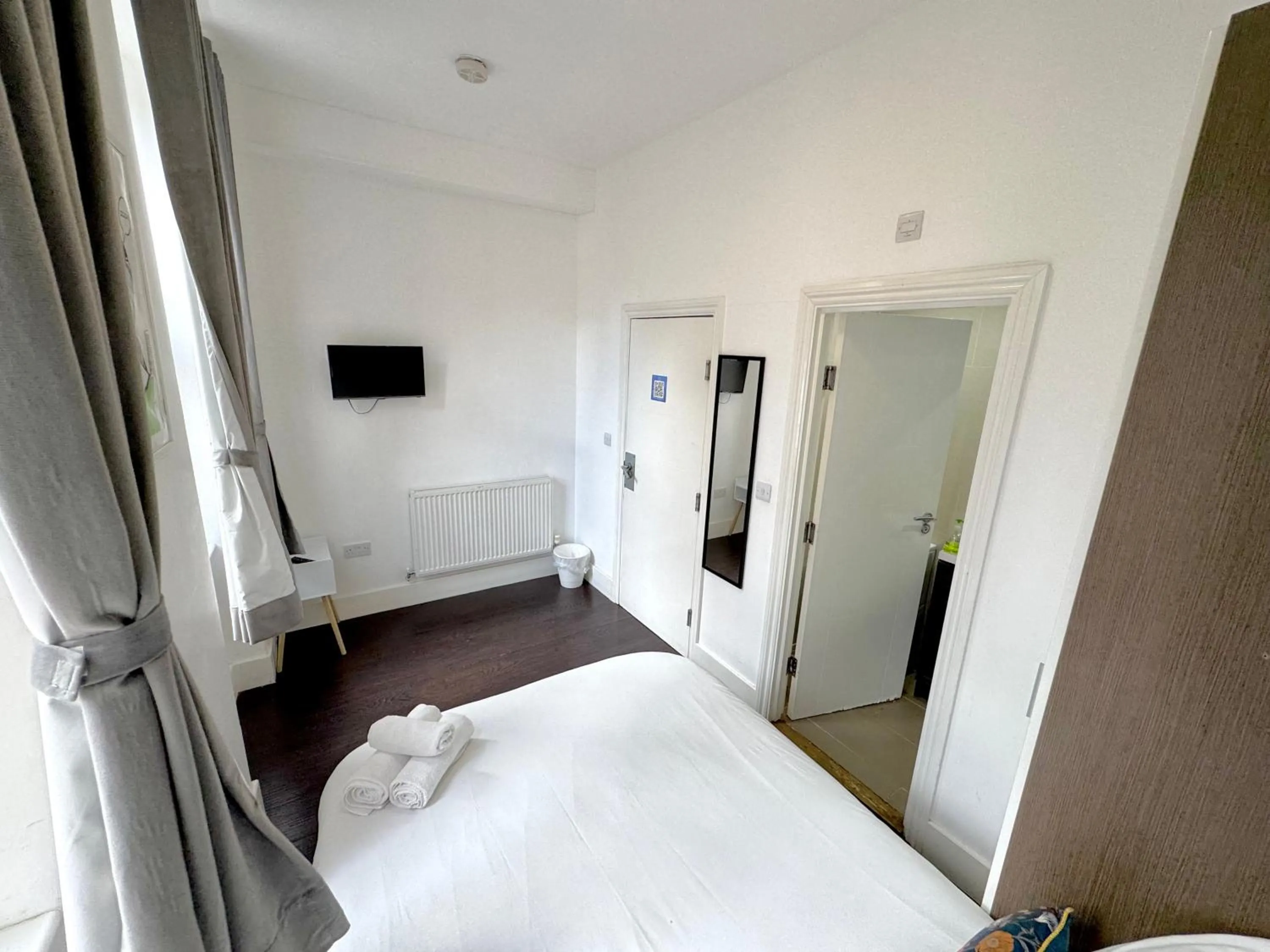 Bed in Charlotte Street Rooms by News Hotel