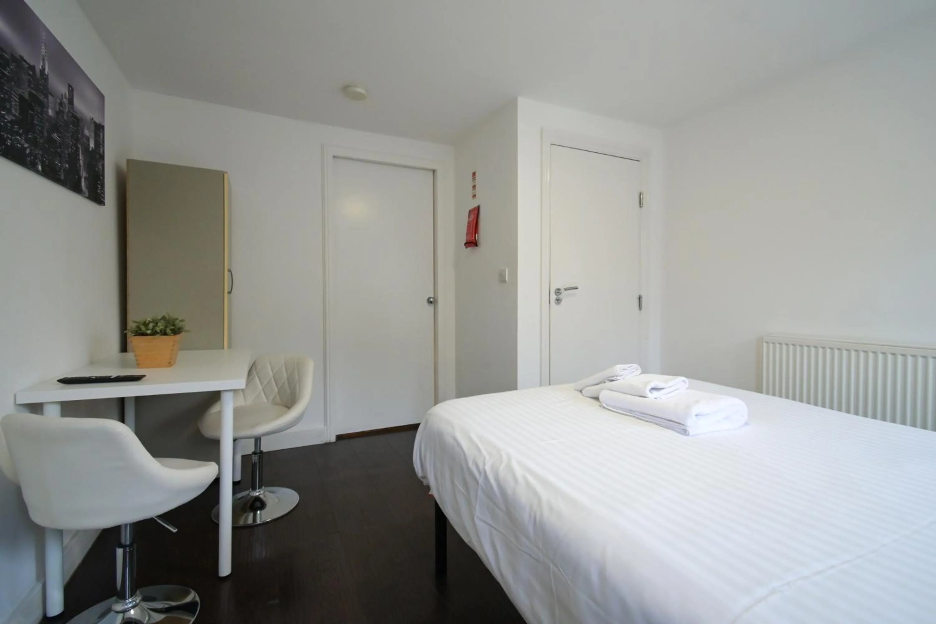 Bed in Charlotte Street Rooms by News Hotel