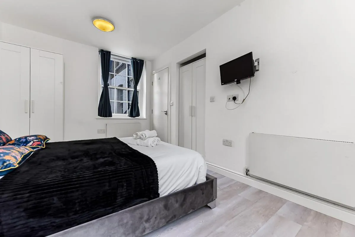 Bed in Charlotte Street Rooms by News Hotel