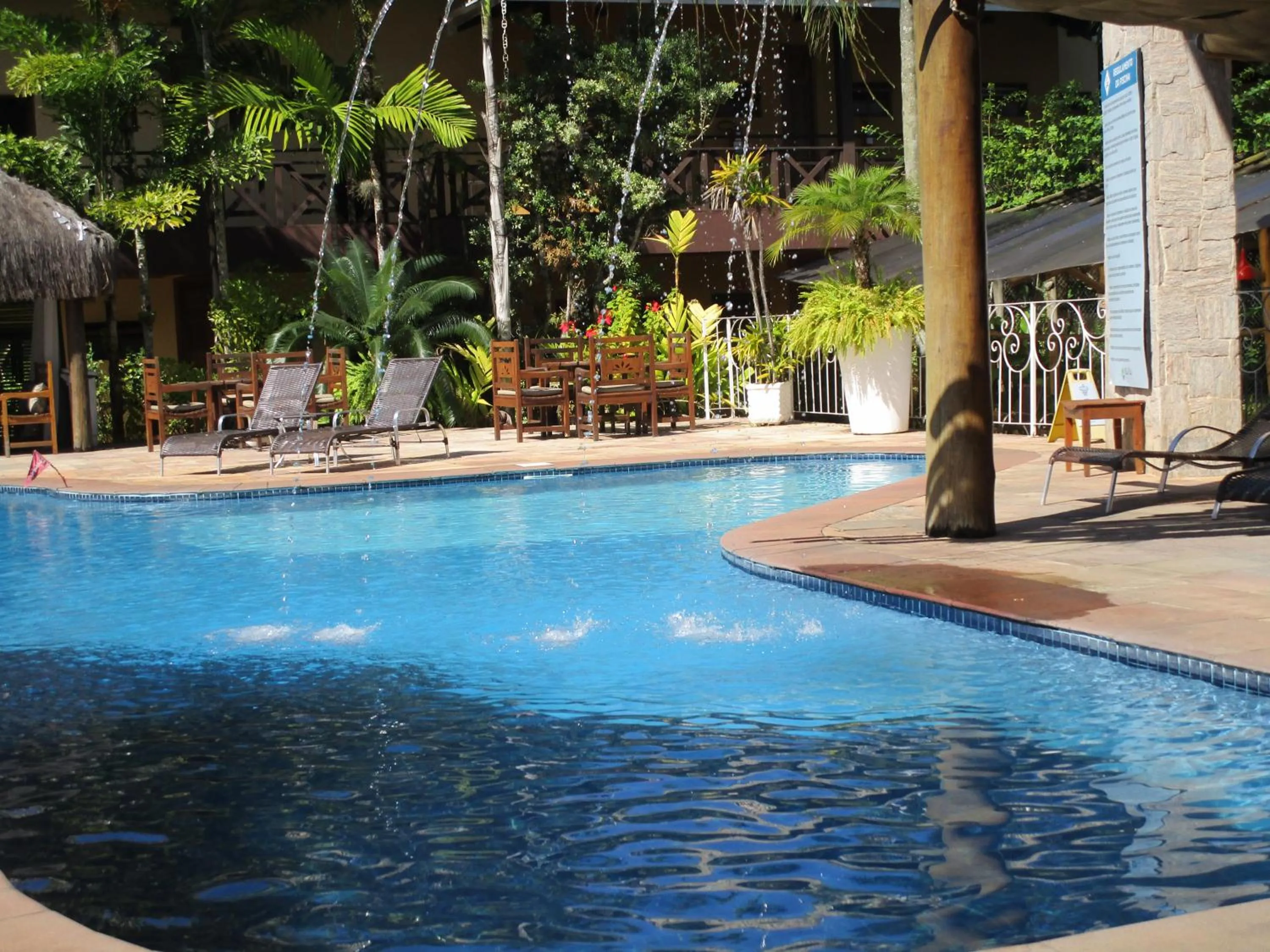 Swimming pool in Ilha flat Hotel Suíte Swaenen II
