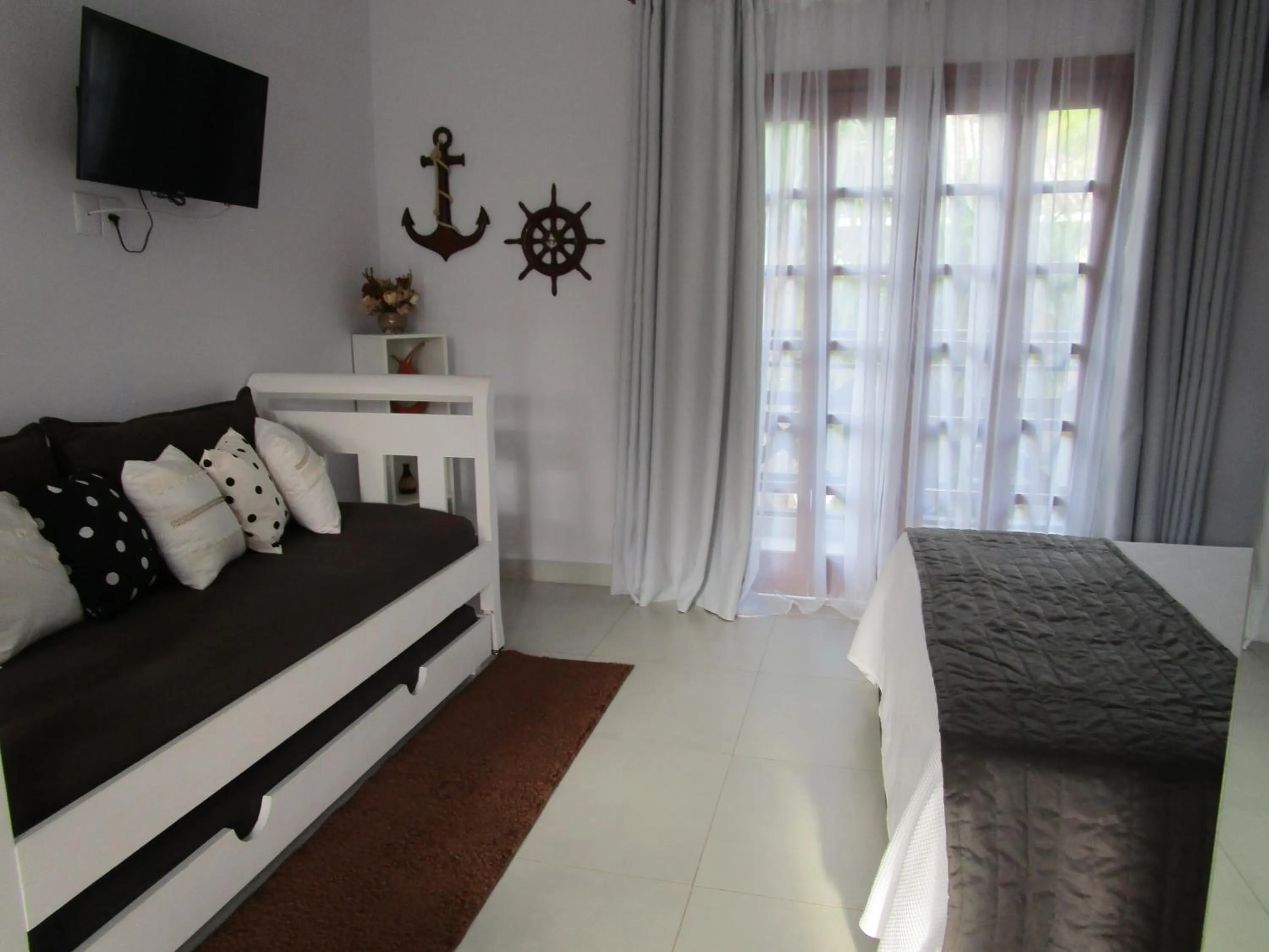 View (from property/room), Bed in Ilha flat Hotel Suíte Swaenen II