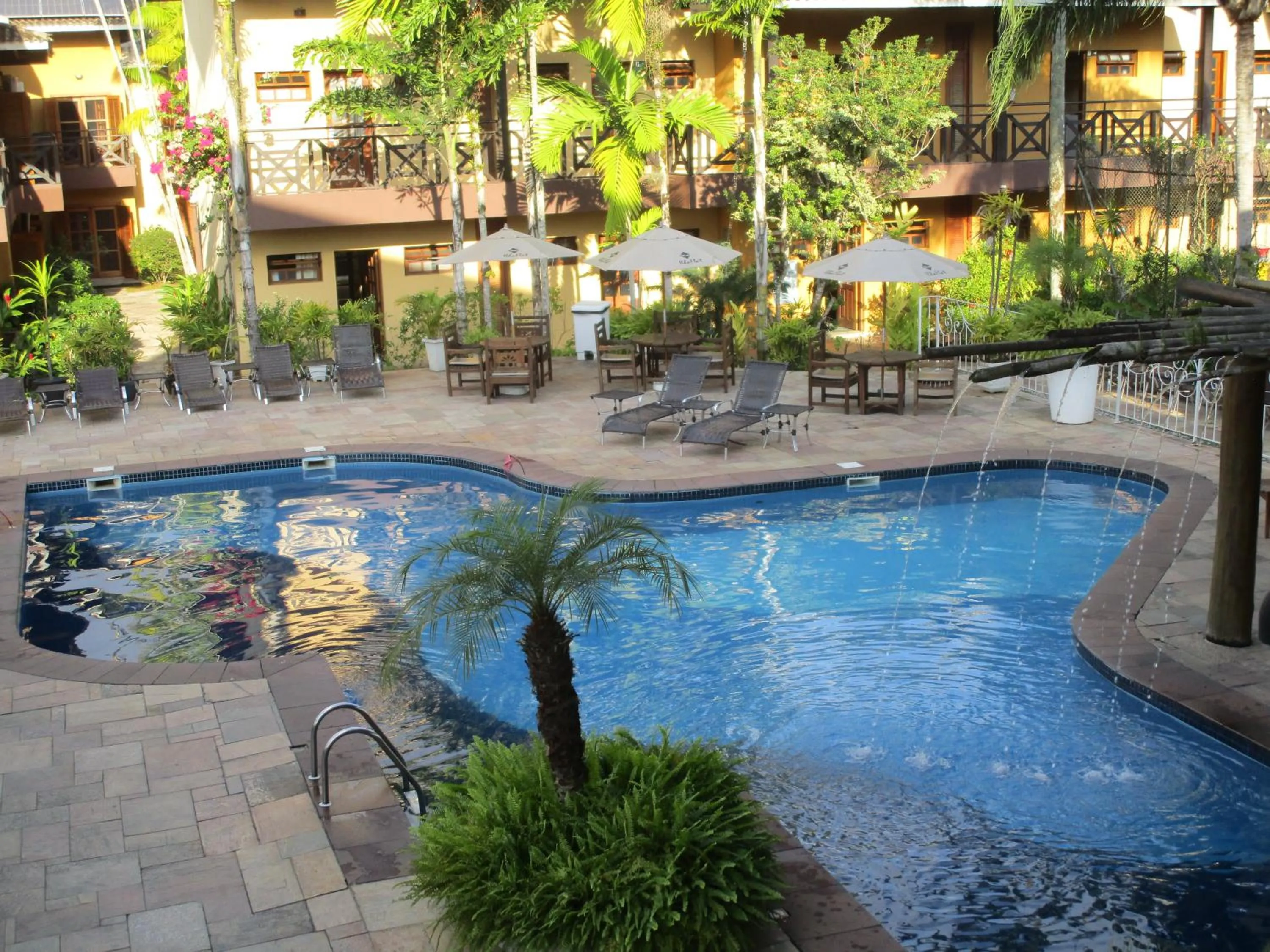 Swimming pool in Ilha flat Hotel Suíte Swaenen II