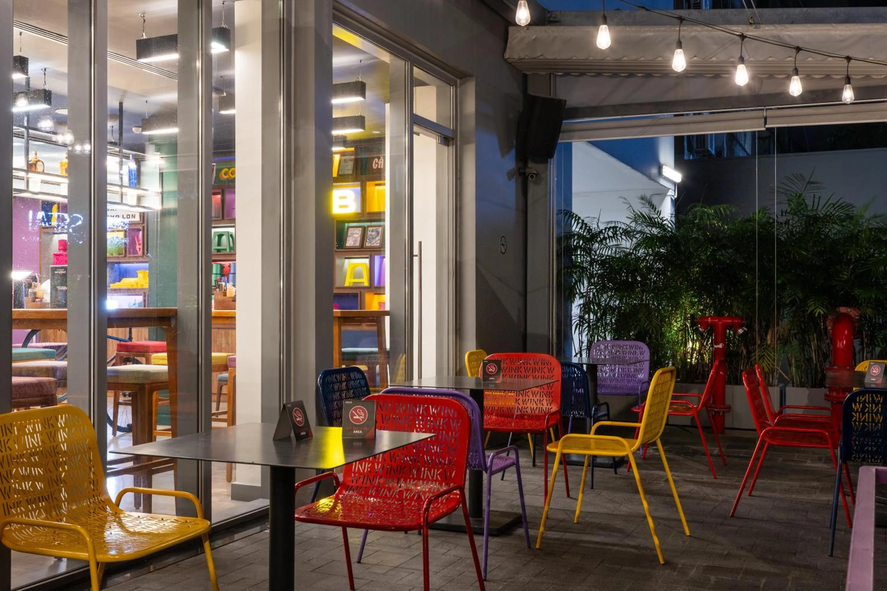 Living room in Wink Saigon Centre, Unscripted by Hyatt