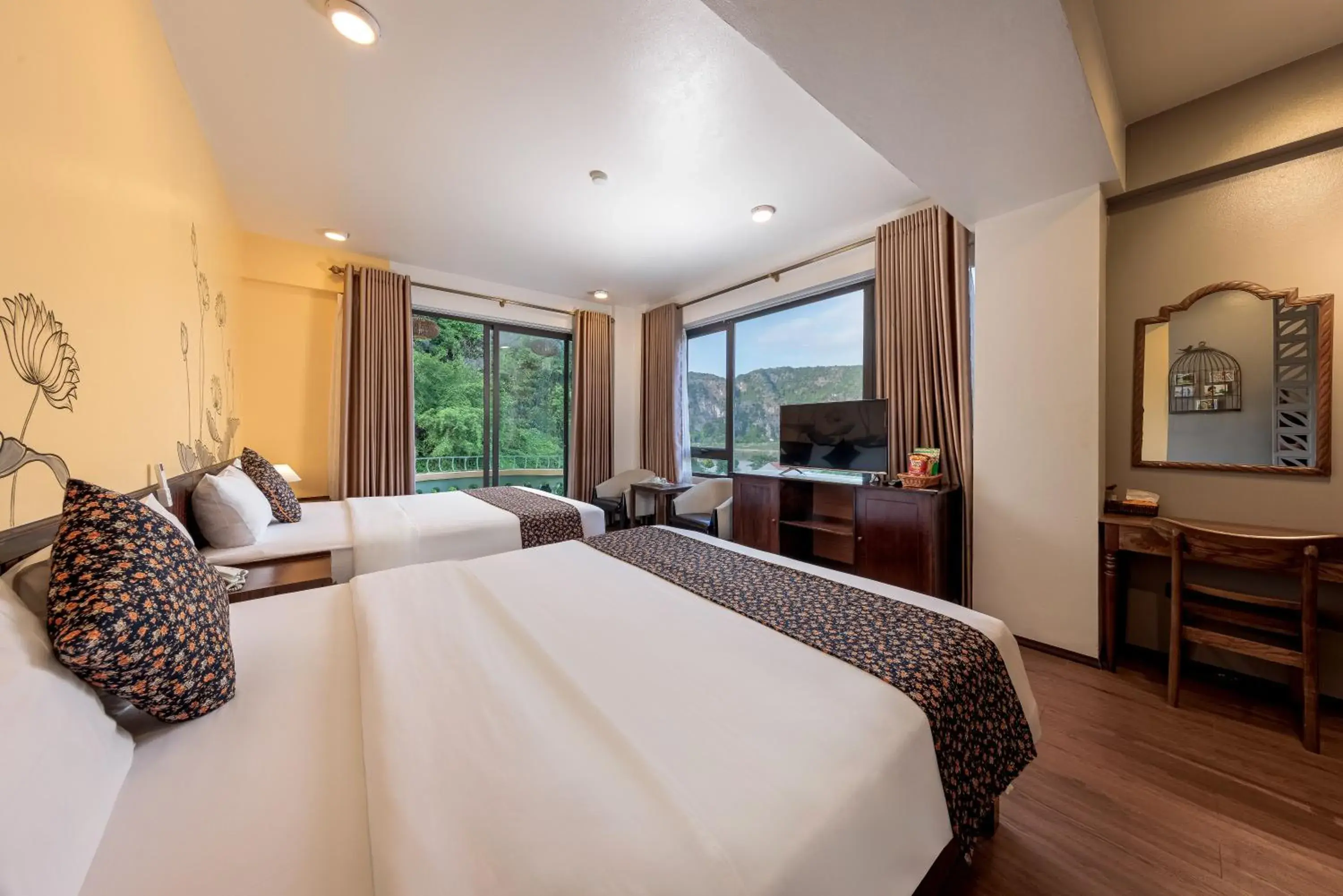 Deluxe Family Room Balcony with Mountain View in Tam Coc Lion Kings Hotel & Resort Ninh Binh Deluxe Family Room Balcony with Mountain View in Tam Coc Lion Kings Hotel & Resort Ninh Binh